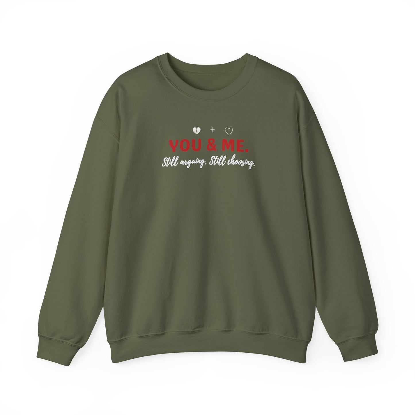 Military green sweatshirt with 'YOU & ME. Still arguing. Still choosing.' text on a white background