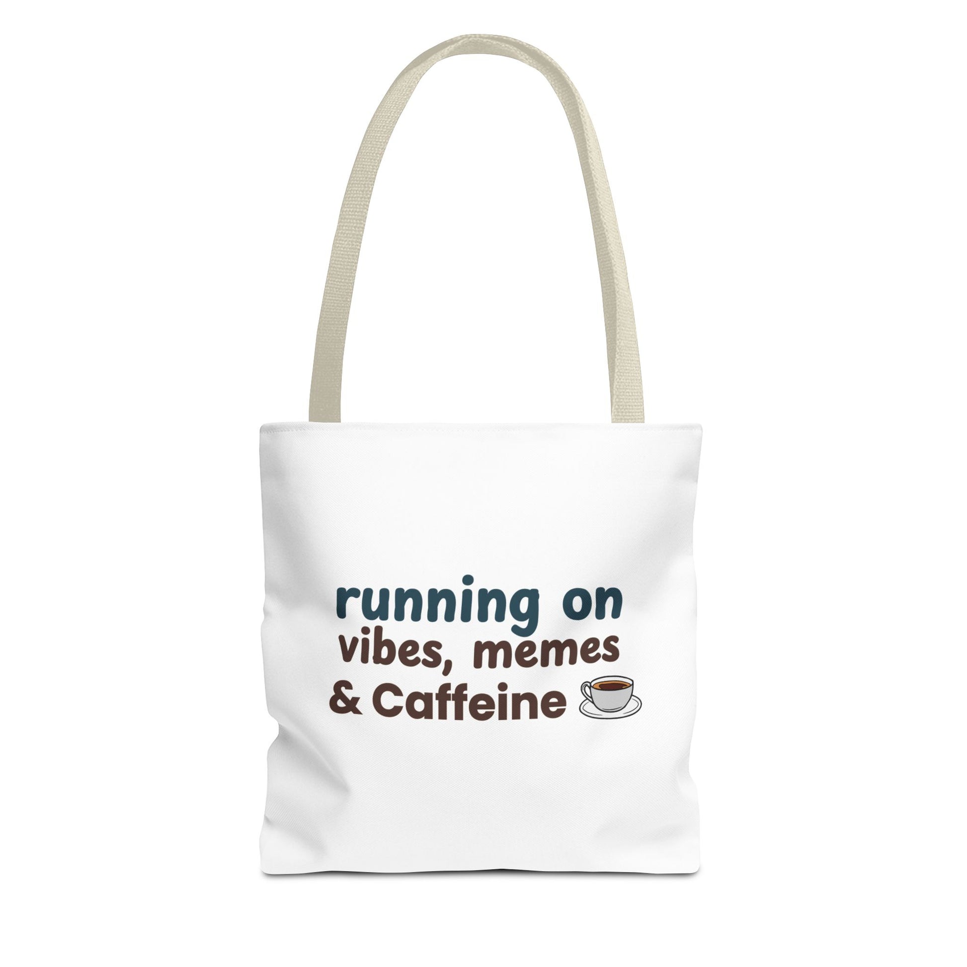 White tote bag with beige handle and text 'running on vibes, memes & caffeine' on a white background