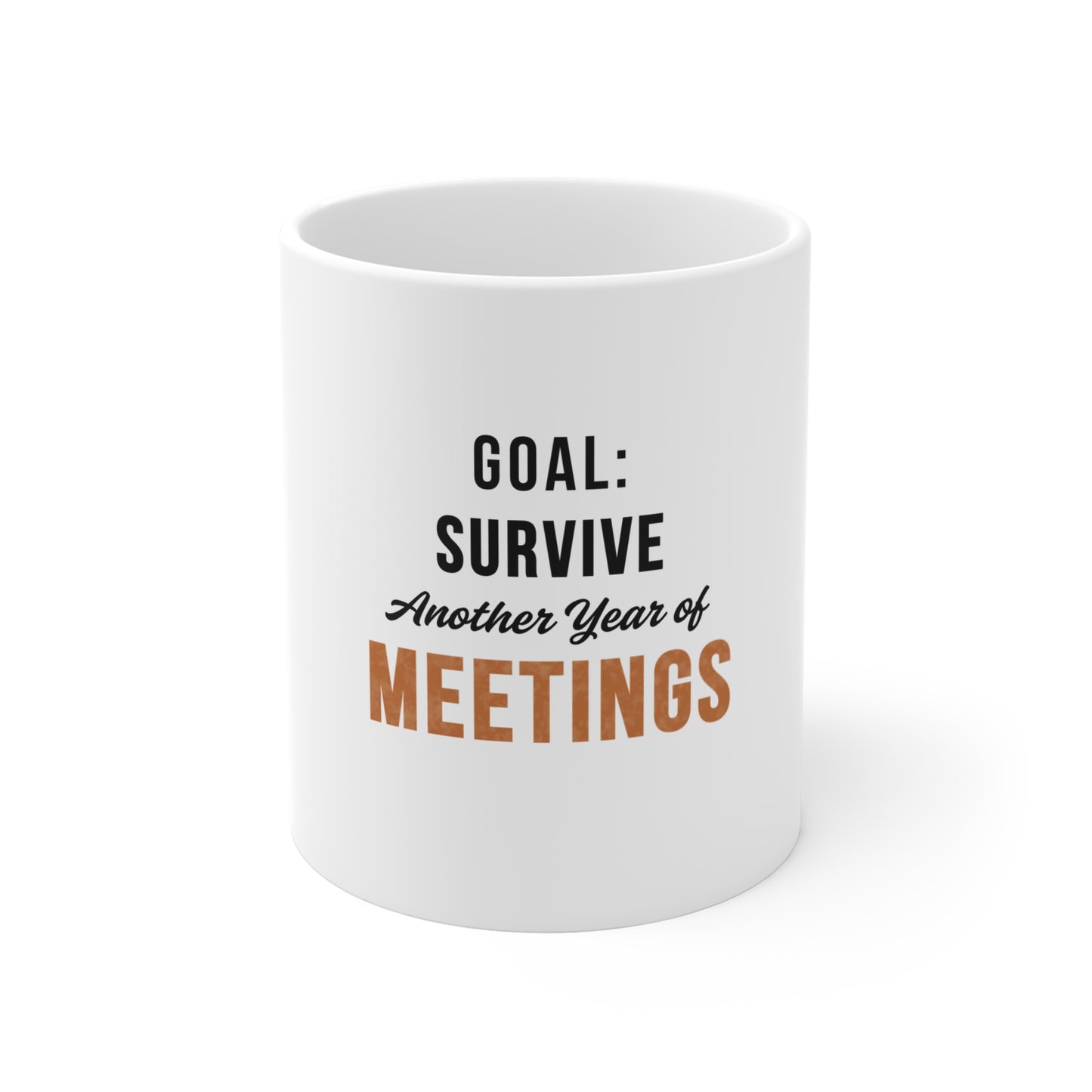 White mug with text 'Goal: Survive Another Year of Meetings' on a white background