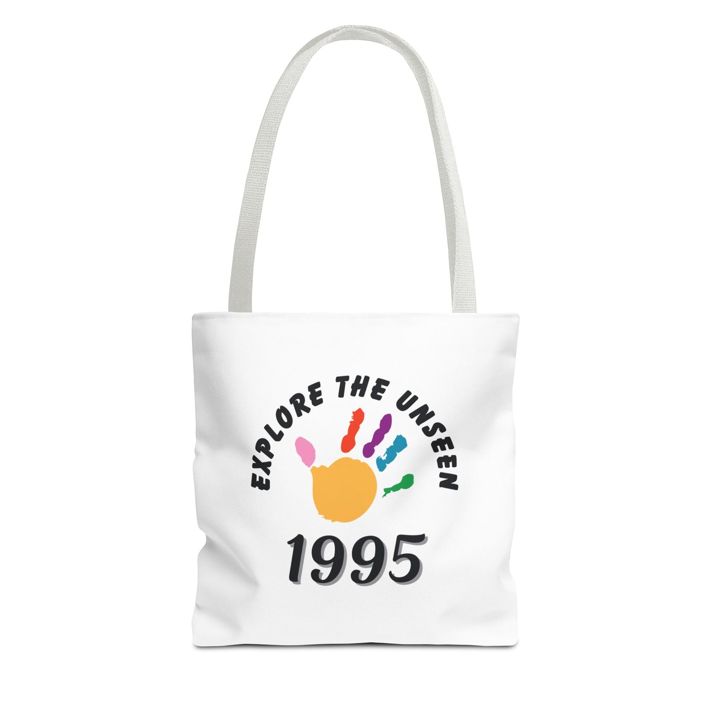 White tote bag with white handle and text 'Explore the Unseen, 1995' on a white background