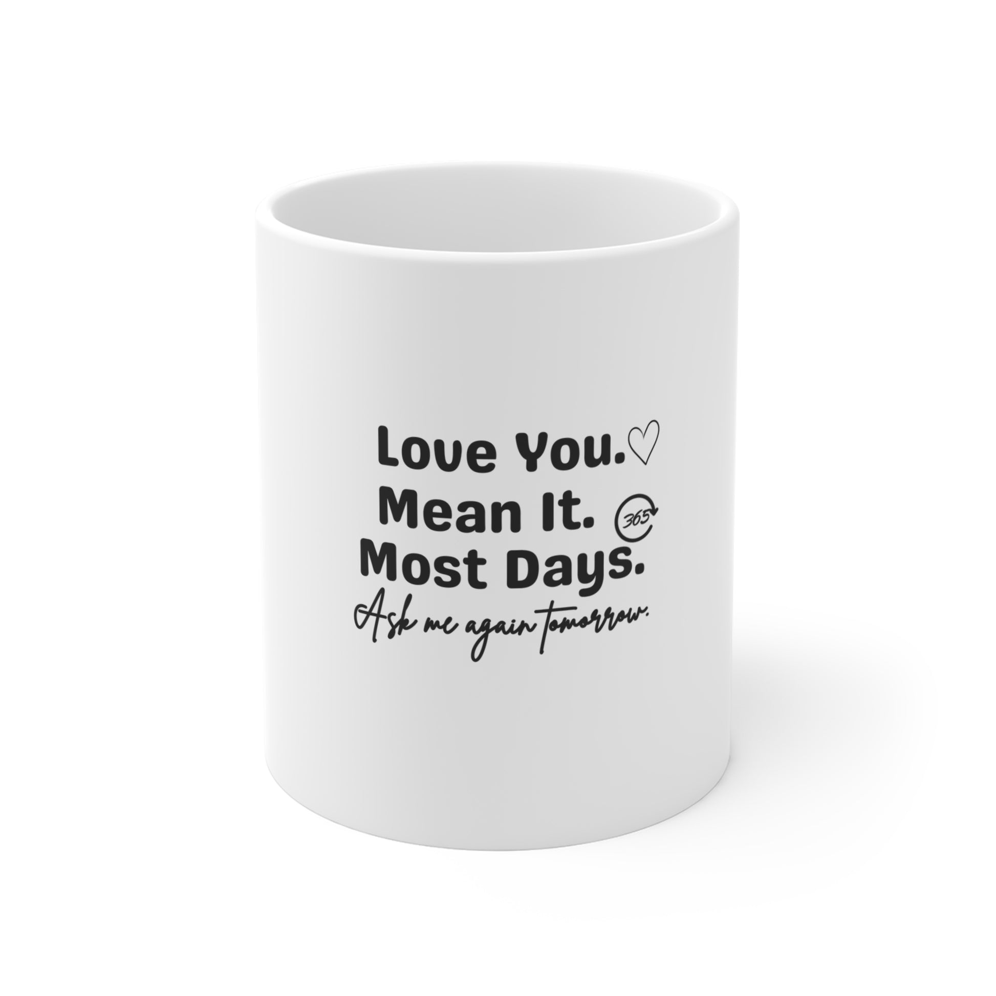 White mug featuring the text 'Love You. Mean It. Most Days. Ask me again tomorrow.' on a white background