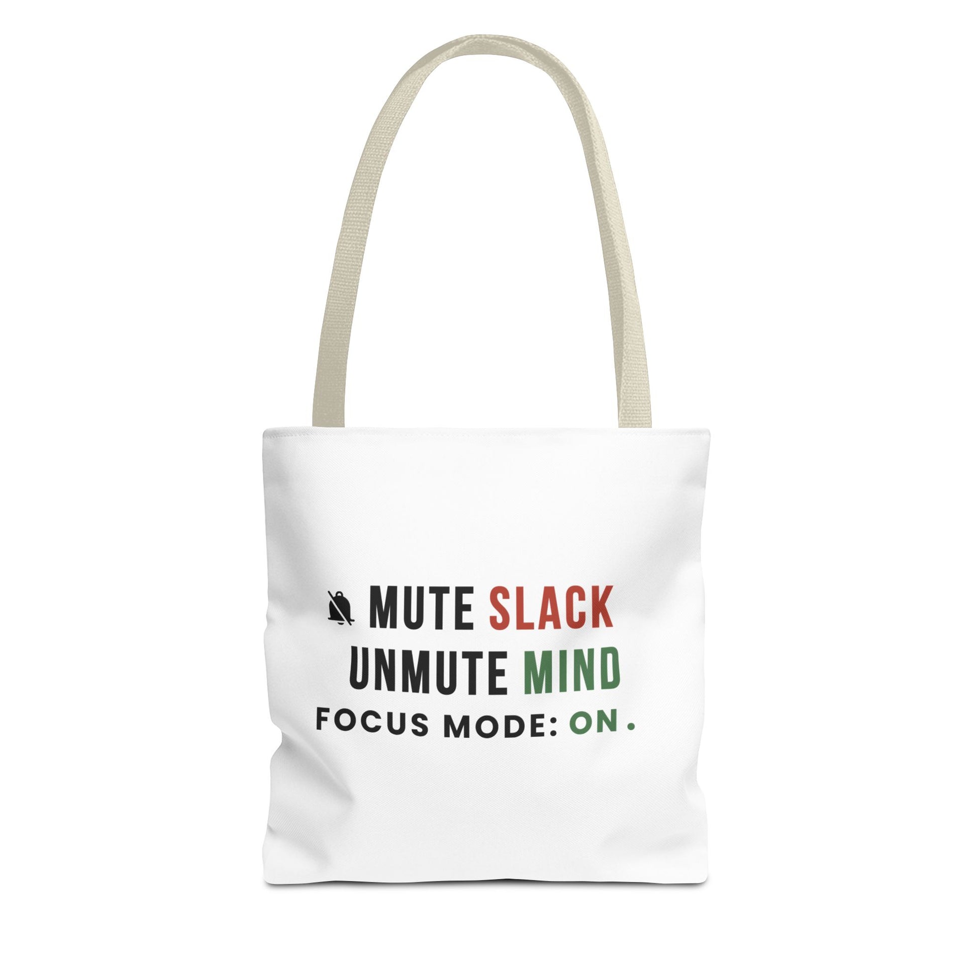 Tote bag with beige handles and text 'Mute Slack, Unmute Mind. Focus Mode: On' on a white background