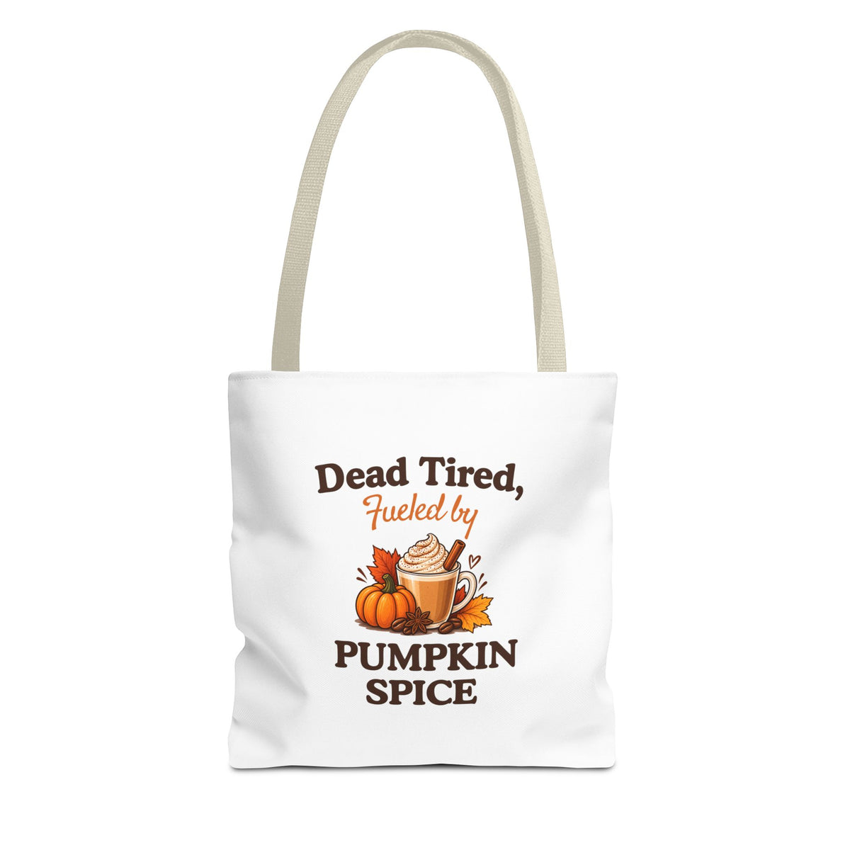 A white canvas tote bag with beige shoulder straps, featuring a printed autumn-themed graphic that reads 'Dead Tired, Fueled by Pumpkin Spice'