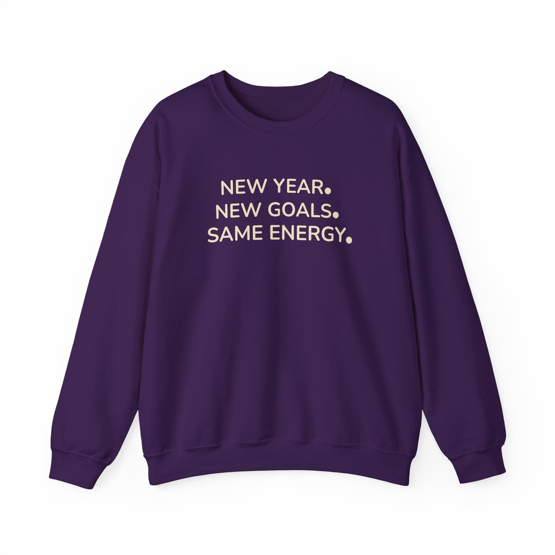 Purple sweatshirt with text 'NEW YEAR. NEW GOALS. SAME ENERGY.' on a white background