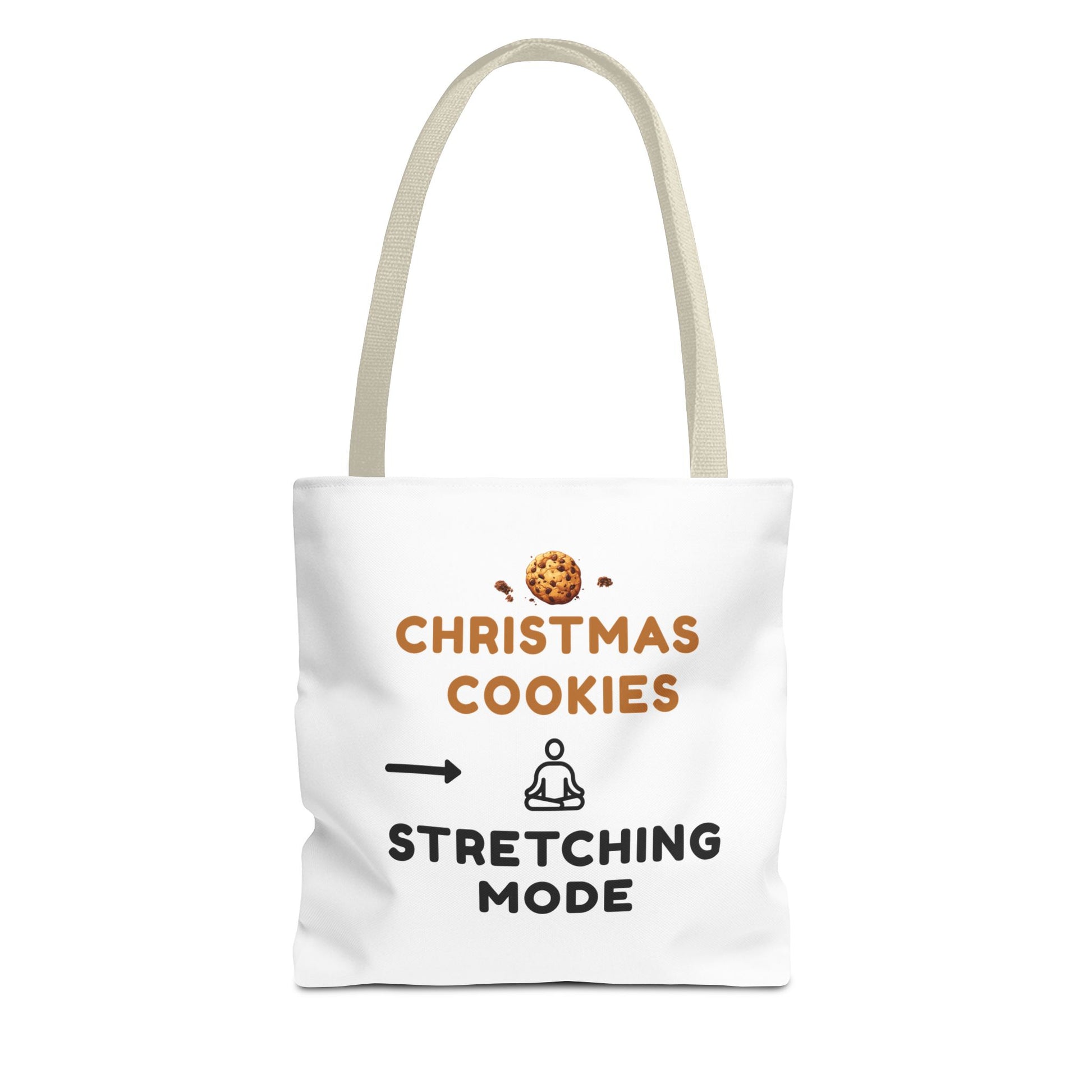 White tote bag with beige handle and text 'Christmas Cookies, Stretching Mode' on a white background