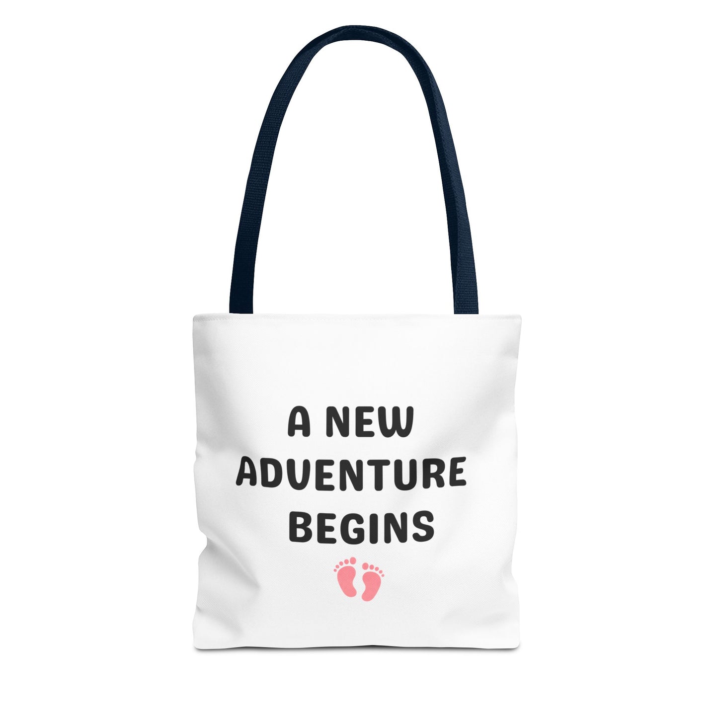 Tote bag with navy handle and text 'A New Adventure Begins' and footprints on a white background