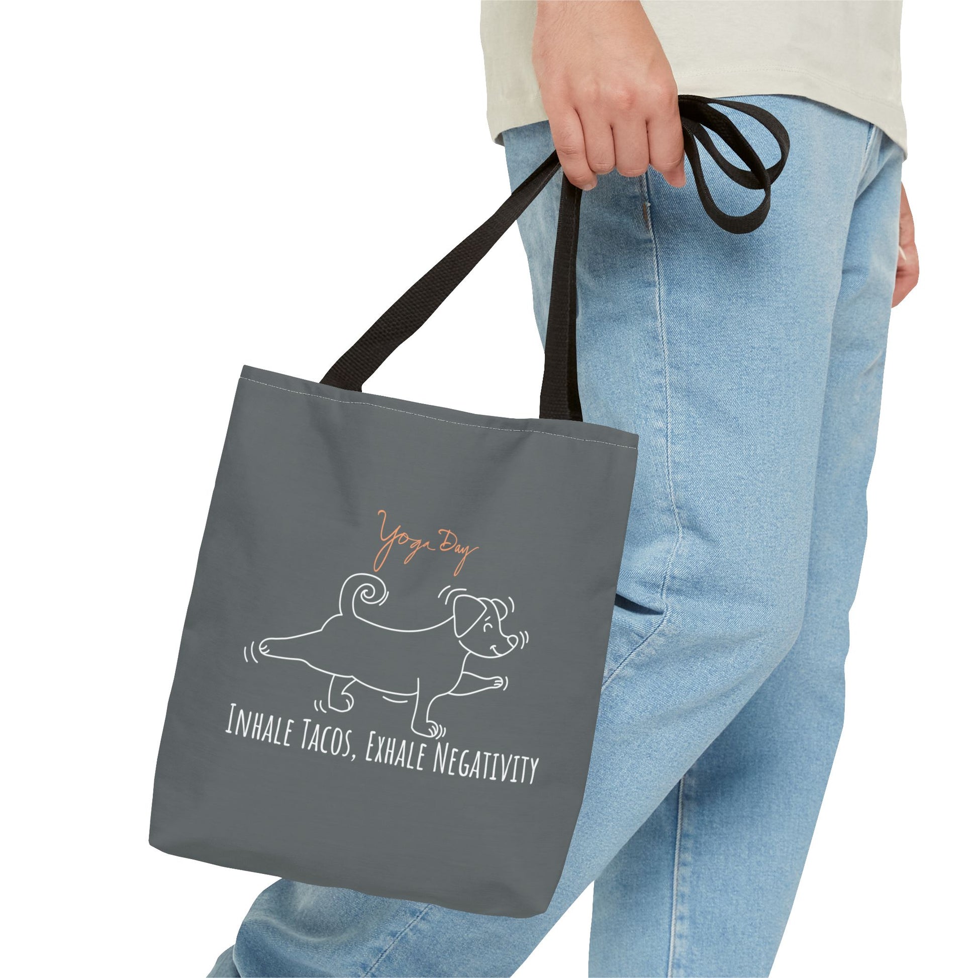 Inhale Tacos Exhale Negativity Tote Bag with 1 man holding grey tote bag - black strap
