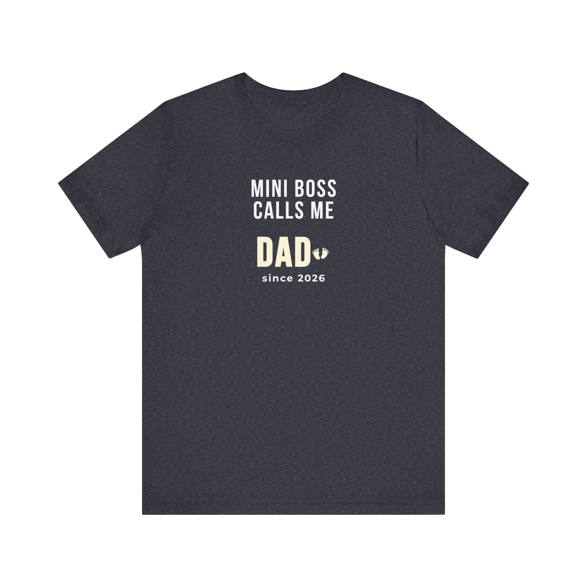 Heather navy t-shirt with white text 'Mini Boss Calls Me Dad – since 2026' on a white background