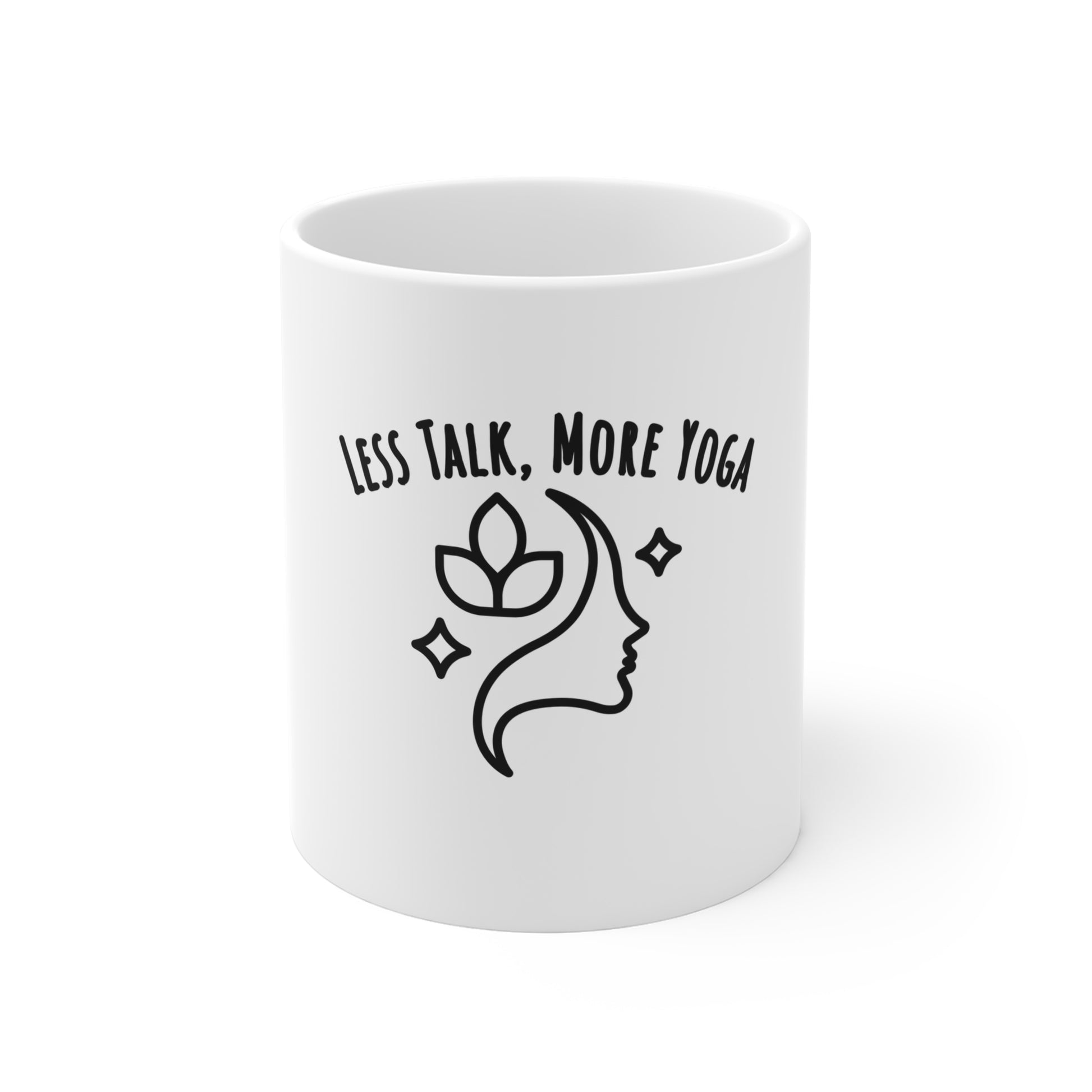 White mug with black text 'Less Talk, More Yoga' on a white background