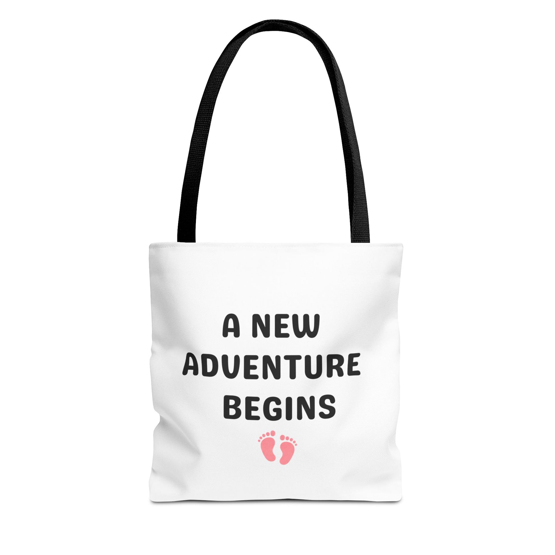 Tote bag with black handle and text 'A New Adventure Begins' and footprints on a white background