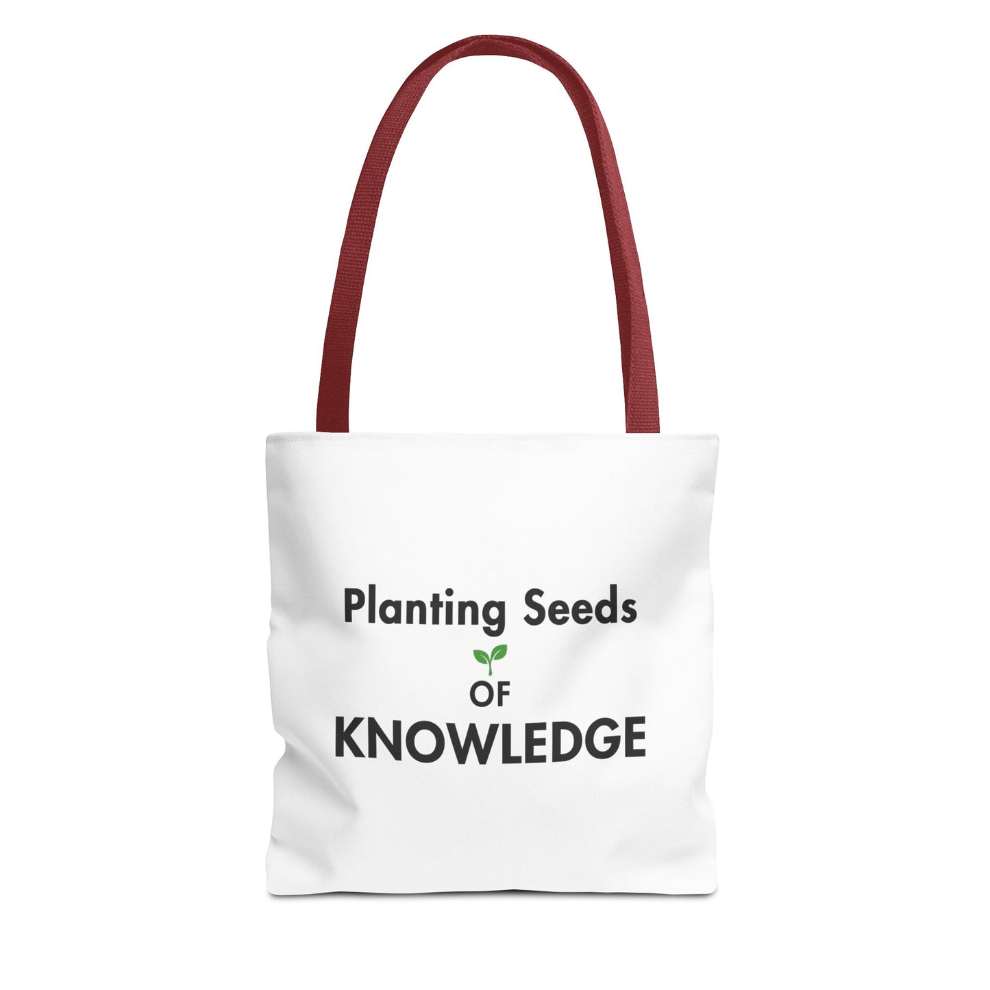 A white canvas tote bag with red handles and the printed text 'Planting Seeds OF KNOWLEDGE', shown on a plain white background.