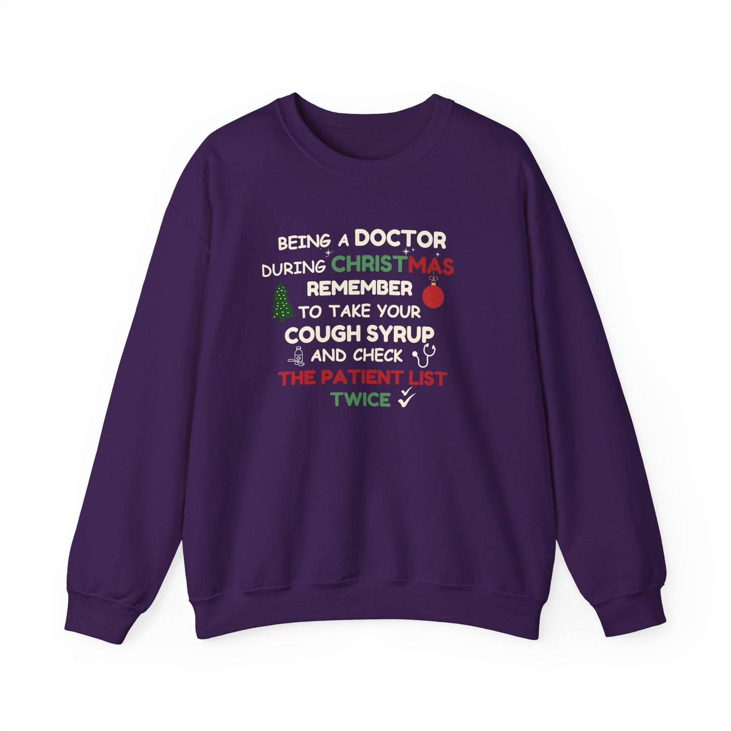 Purple sweatshirt with text 'Being a doctor during Christmas, remember to take your cough syrup and check the patient list twice' on a white background