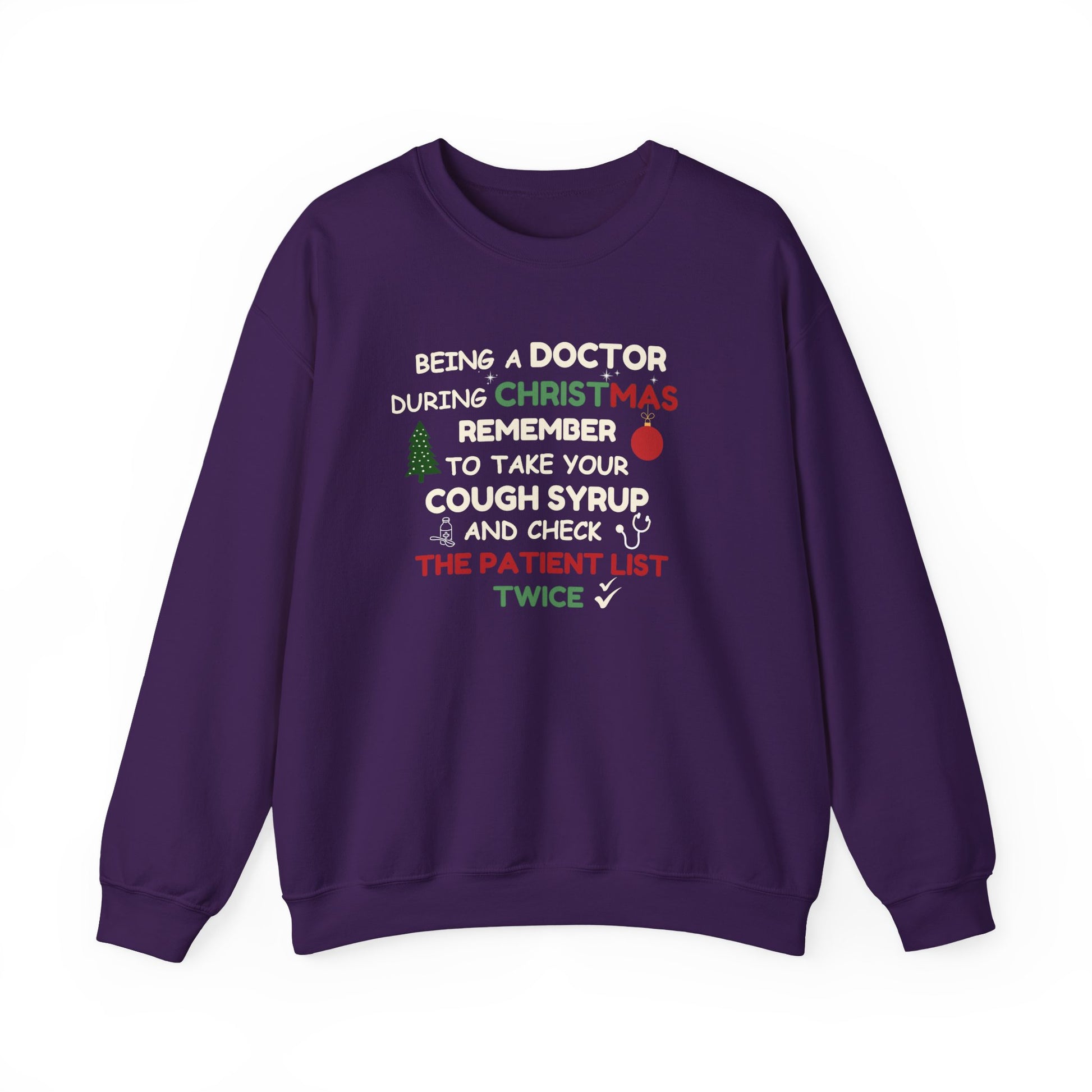 Purple sweatshirt with text 'Being a doctor during Christmas, remember to take your cough syrup and check the patient list twice' on a white background