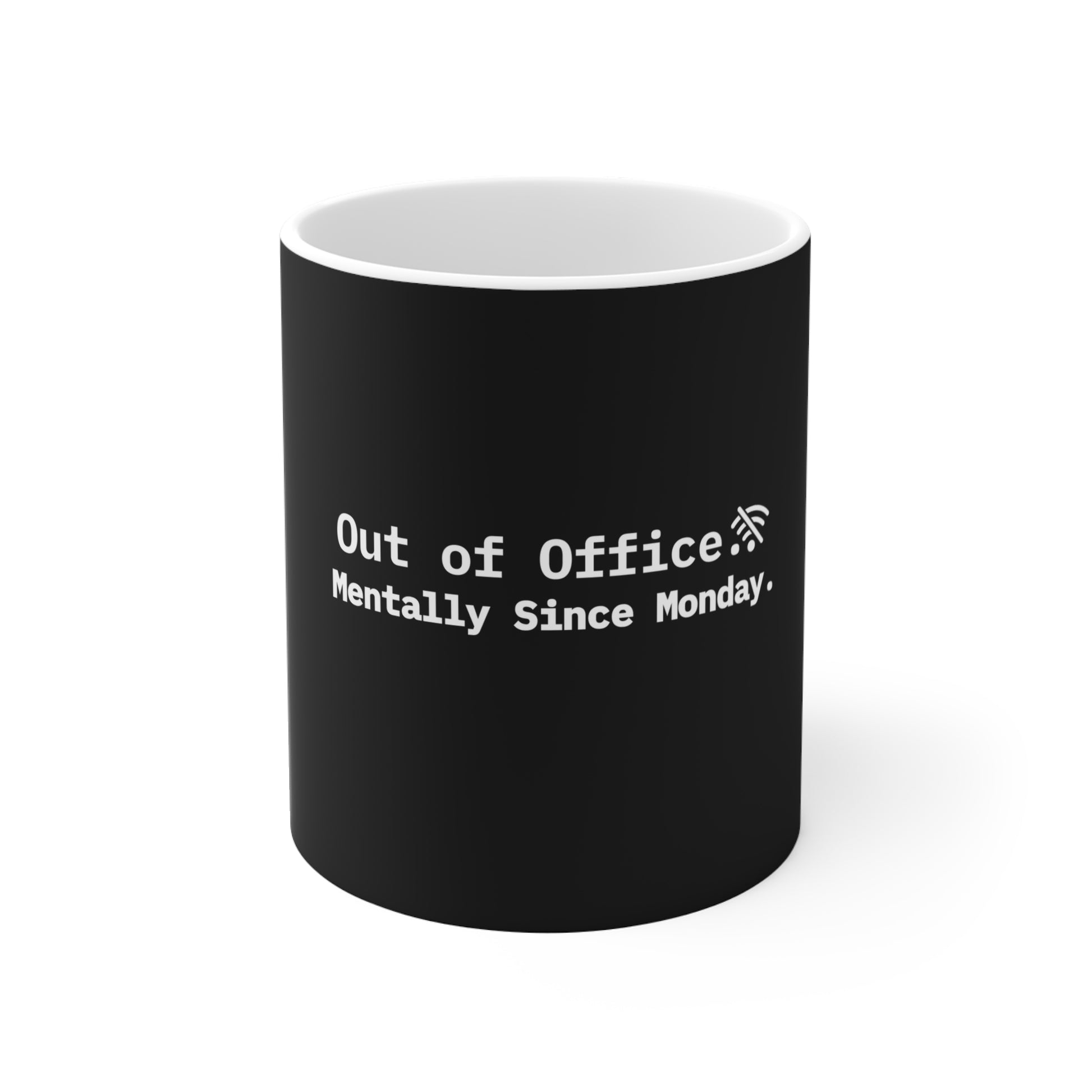 Black mug with white text 'Out of Office Mentally Since Monday' on a white background