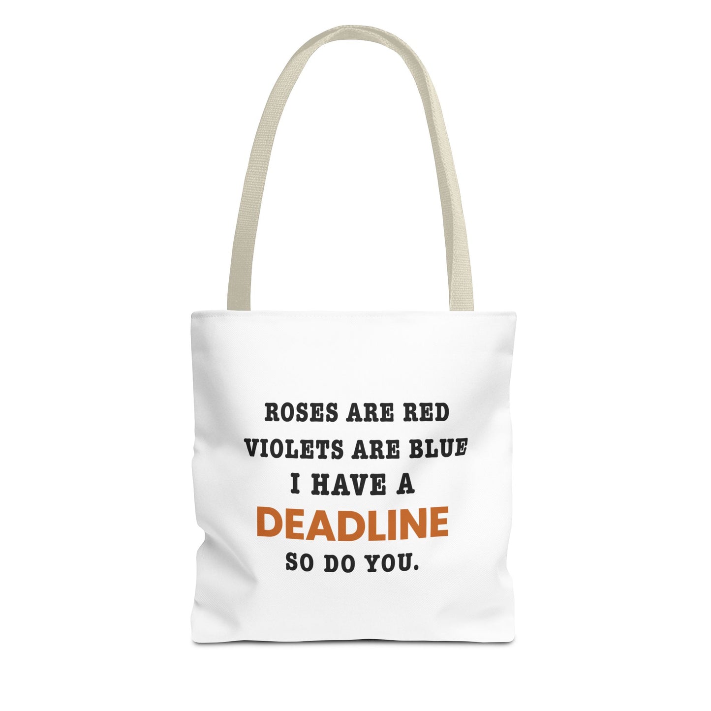 Tote bag with beige handles and text 'Roes are red, violets are blue. I have a deadline so you do' on a white background