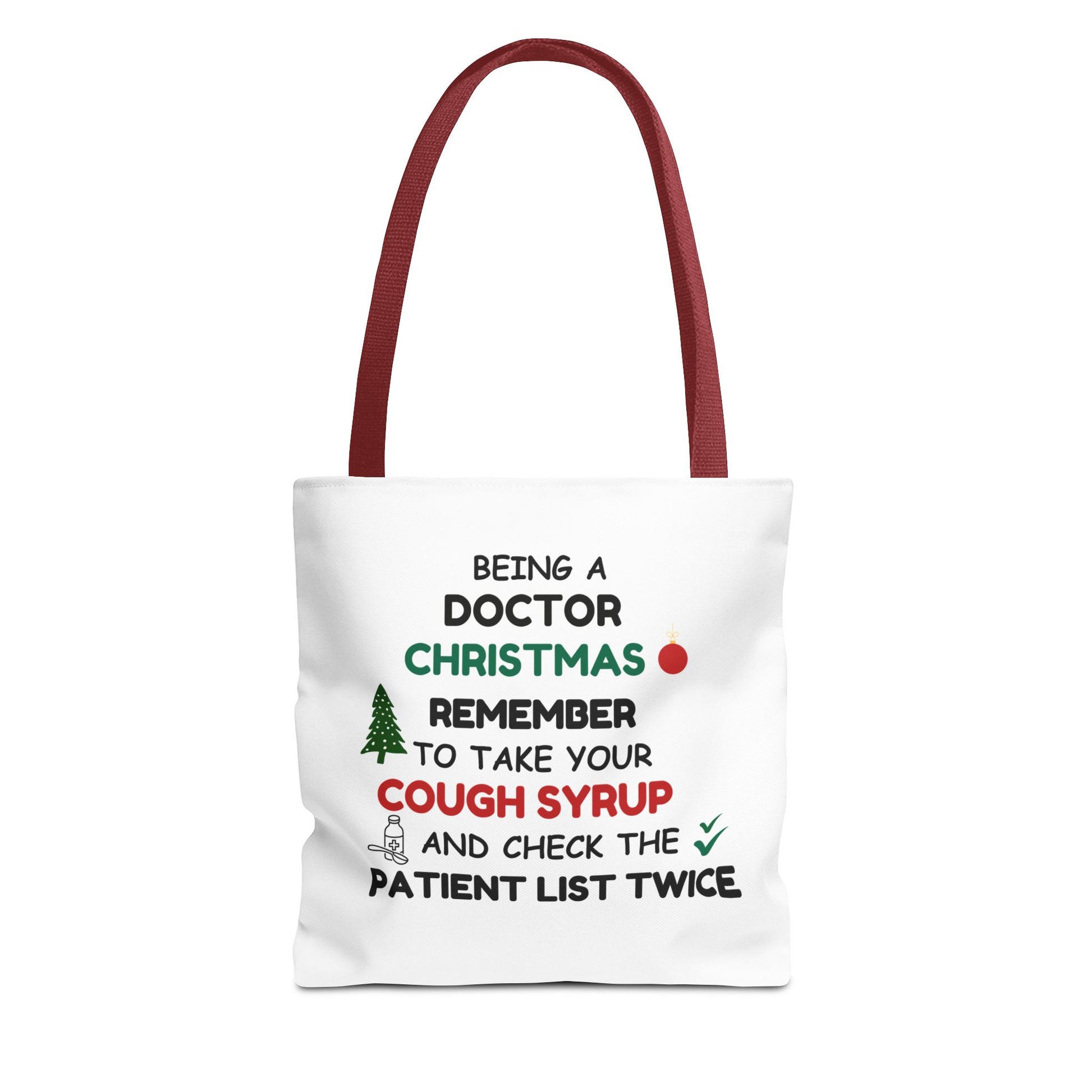 White tote bag with red handle and  text 'Being a doctor during Christmas, remember to take your cough syrup and check the patient list twice' on a white background