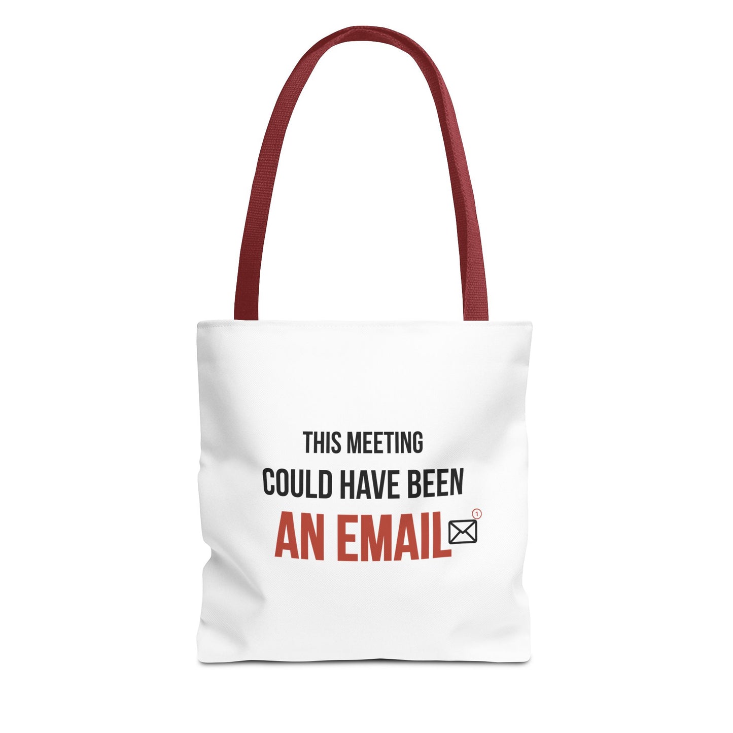 Tote bag with red handles and text 'This meeting could have been an email' on a white background