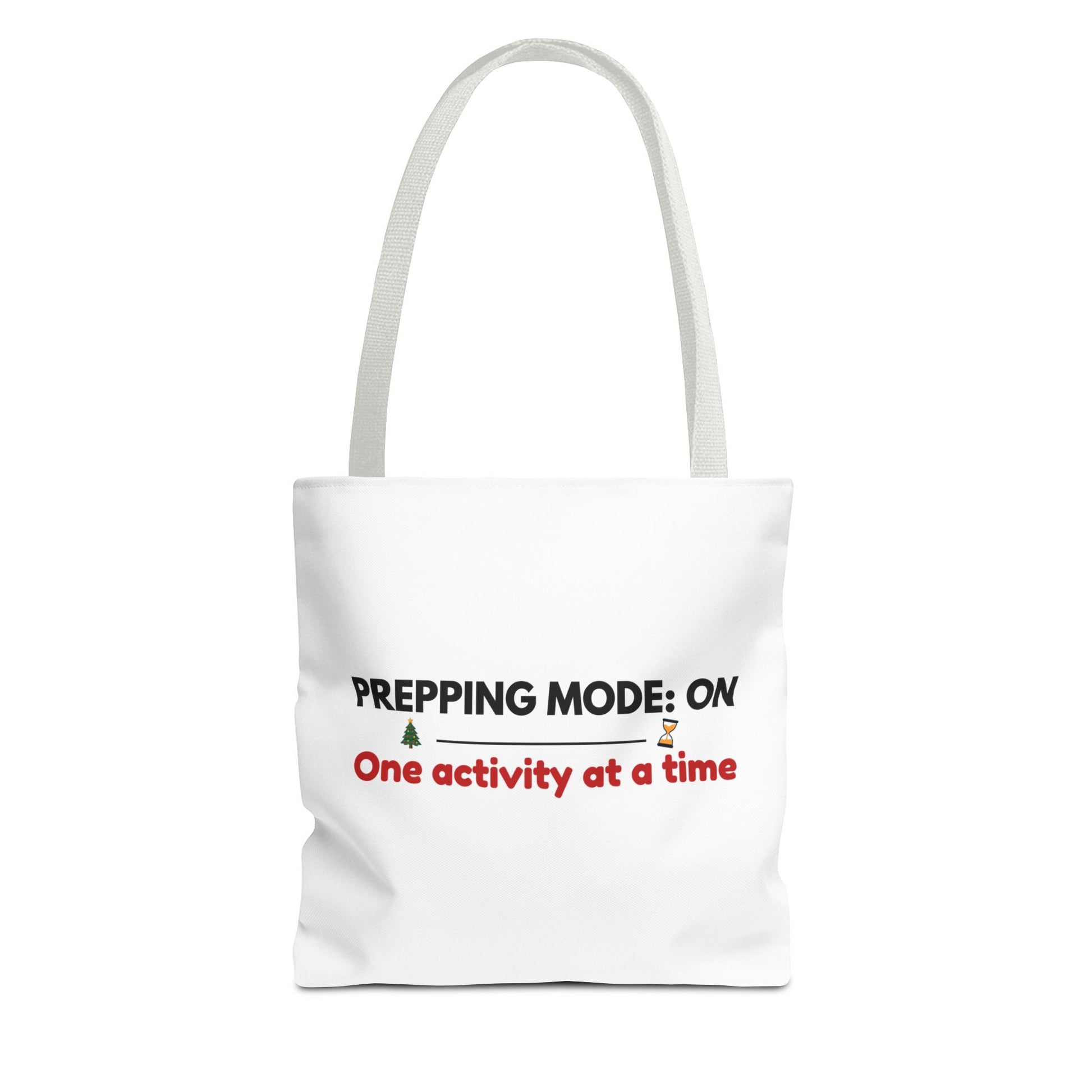 Tote bag with white handle and text 'Prepping Mode: On One Activity at a Time' on a white background