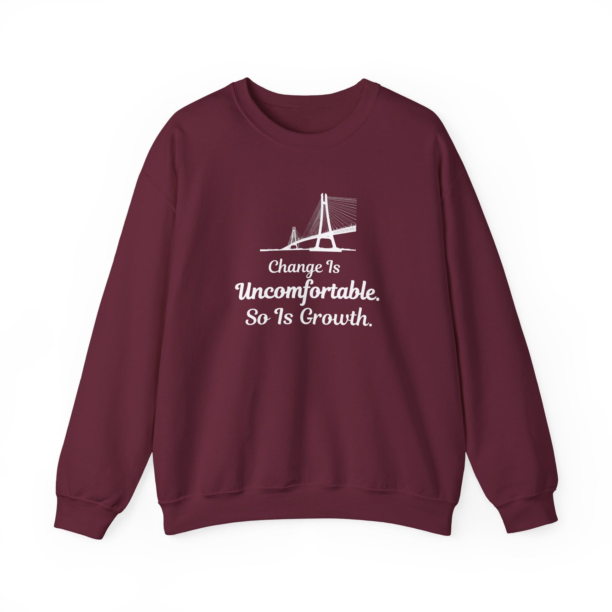 Maroon sweatshirt with text 'Change Is Uncomfortable. So Is Growth' and graphic on a white background