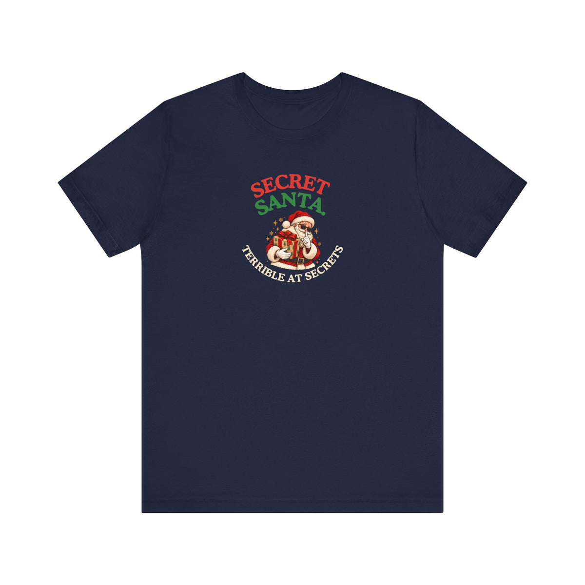 Navy t-shirt featuring the “Secret Santa. Terrible at Secrets.” design on a white background