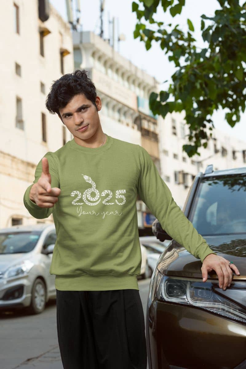2025: Your Year Sweatshirt with a guy posing on his car