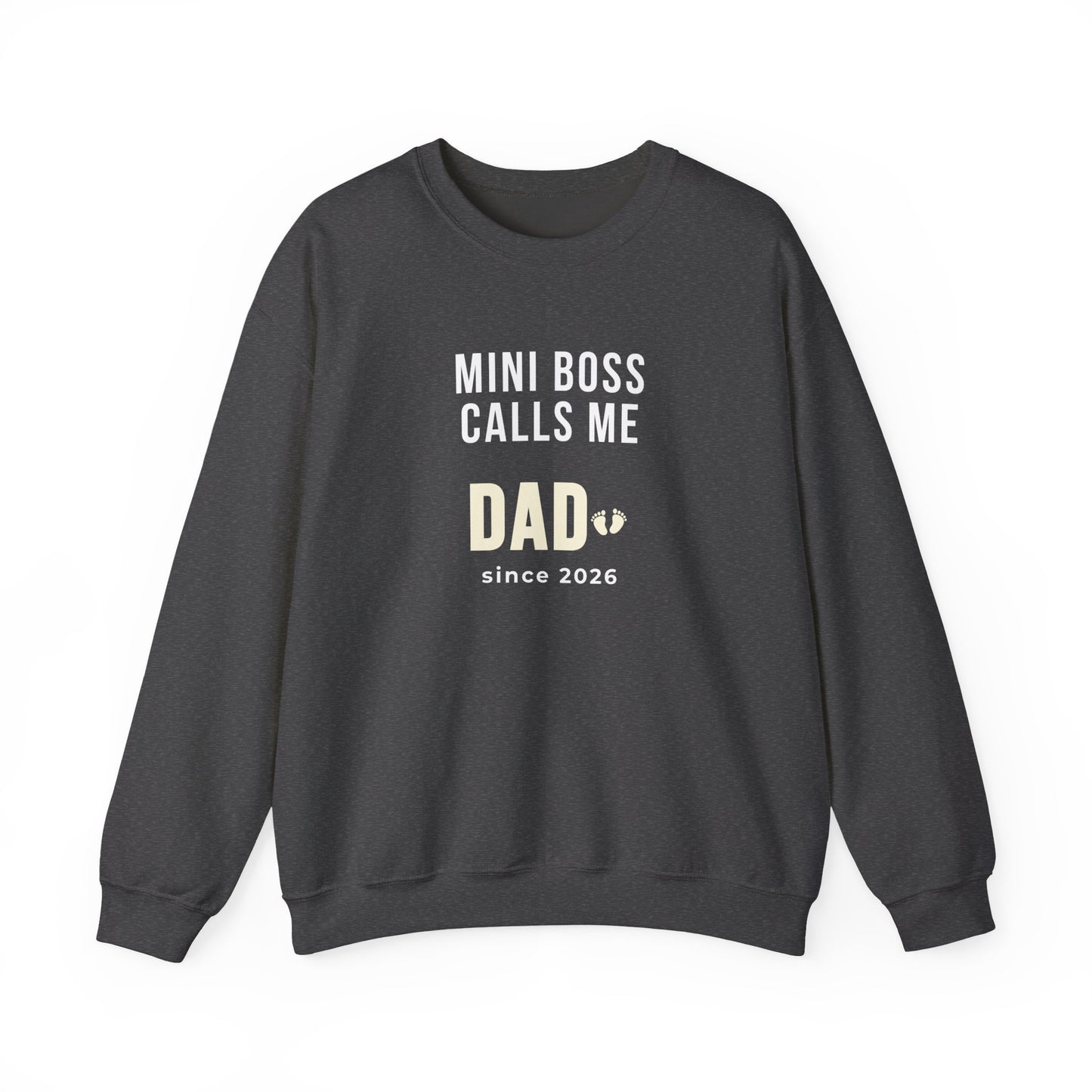 Dark gray sweatshirt with text 'Mini Boss Calls Me Dad – since 2026' on a white background