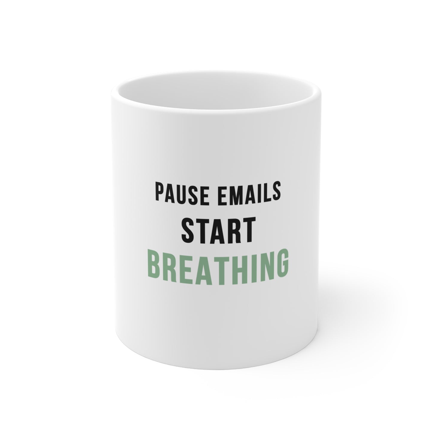 White mug with text 'Pause Emails, Start Breathing' on a white background
