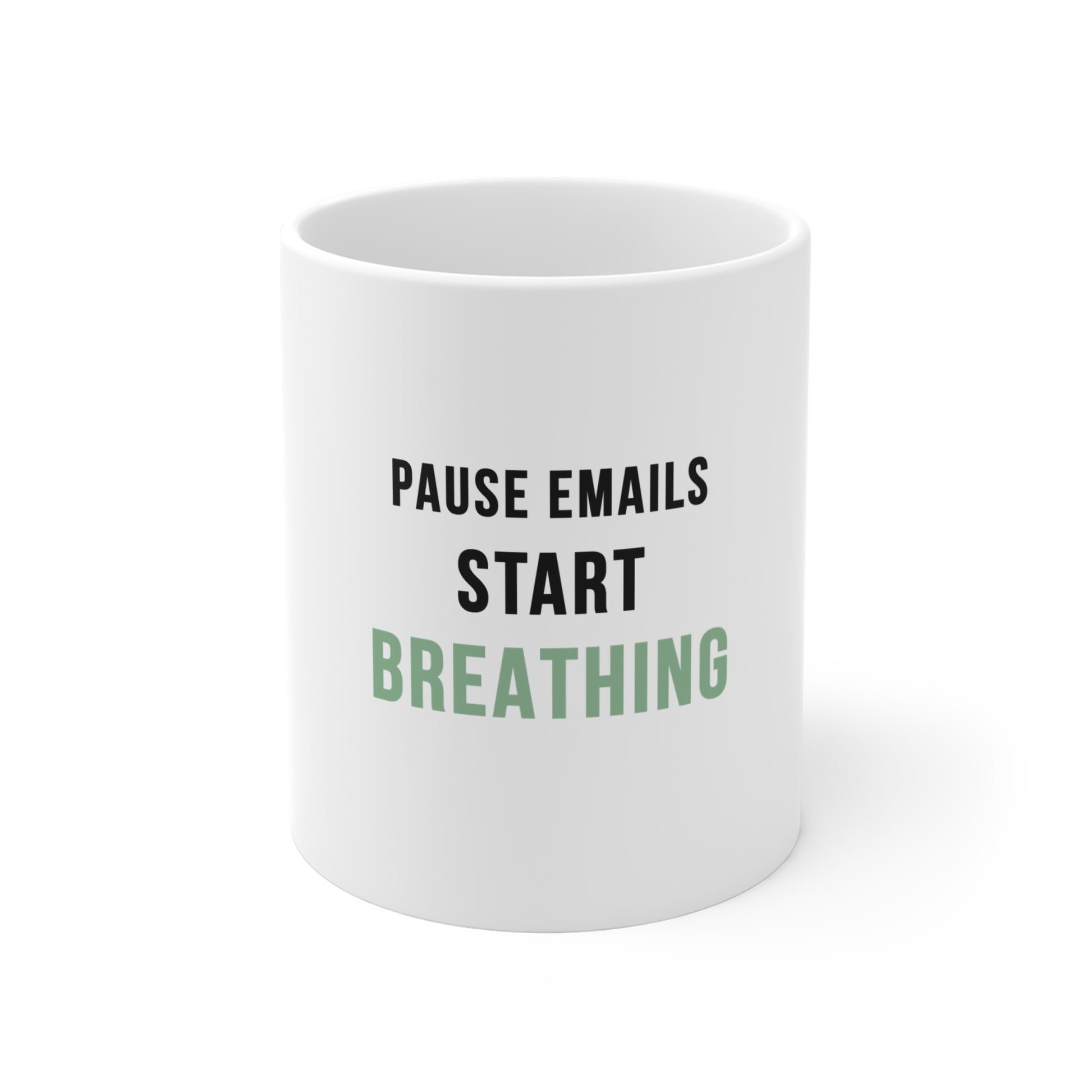 White mug with text 'Pause Emails, Start Breathing' on a white background