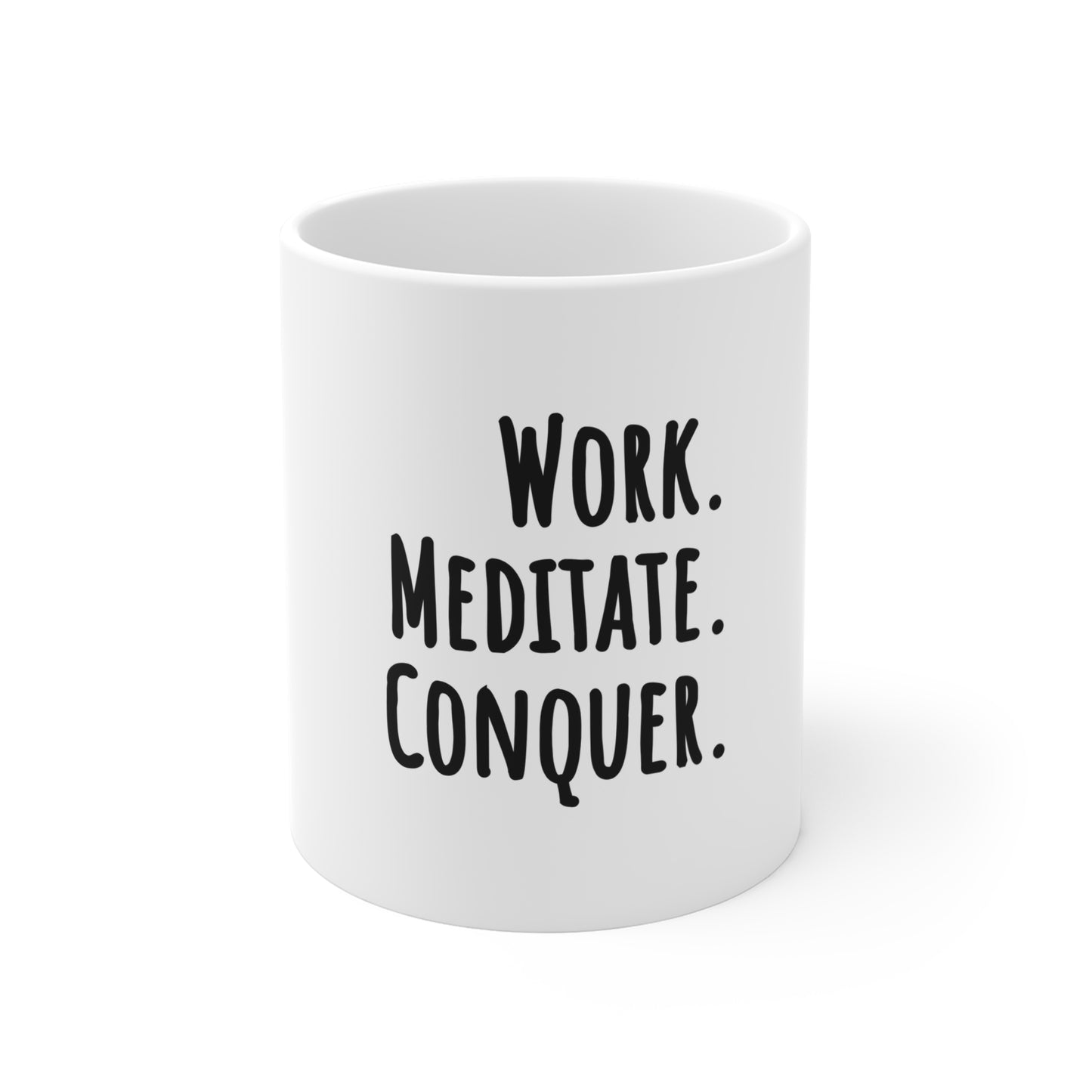 White mug with black text 'Work. Meditate. Conquer.' on a white background