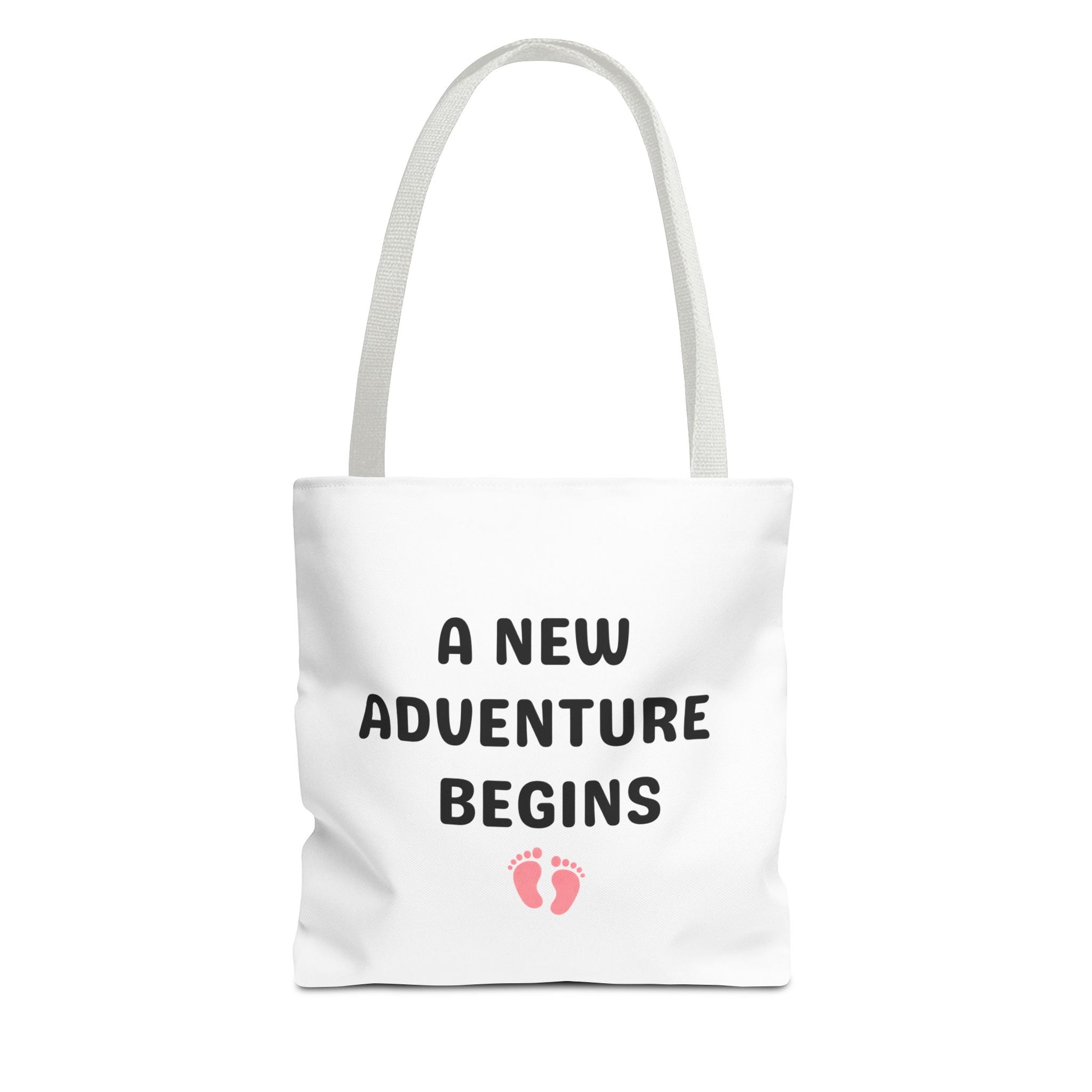 Tote bag with white handle and text 'A New Adventure Begins' and footprints on a white background