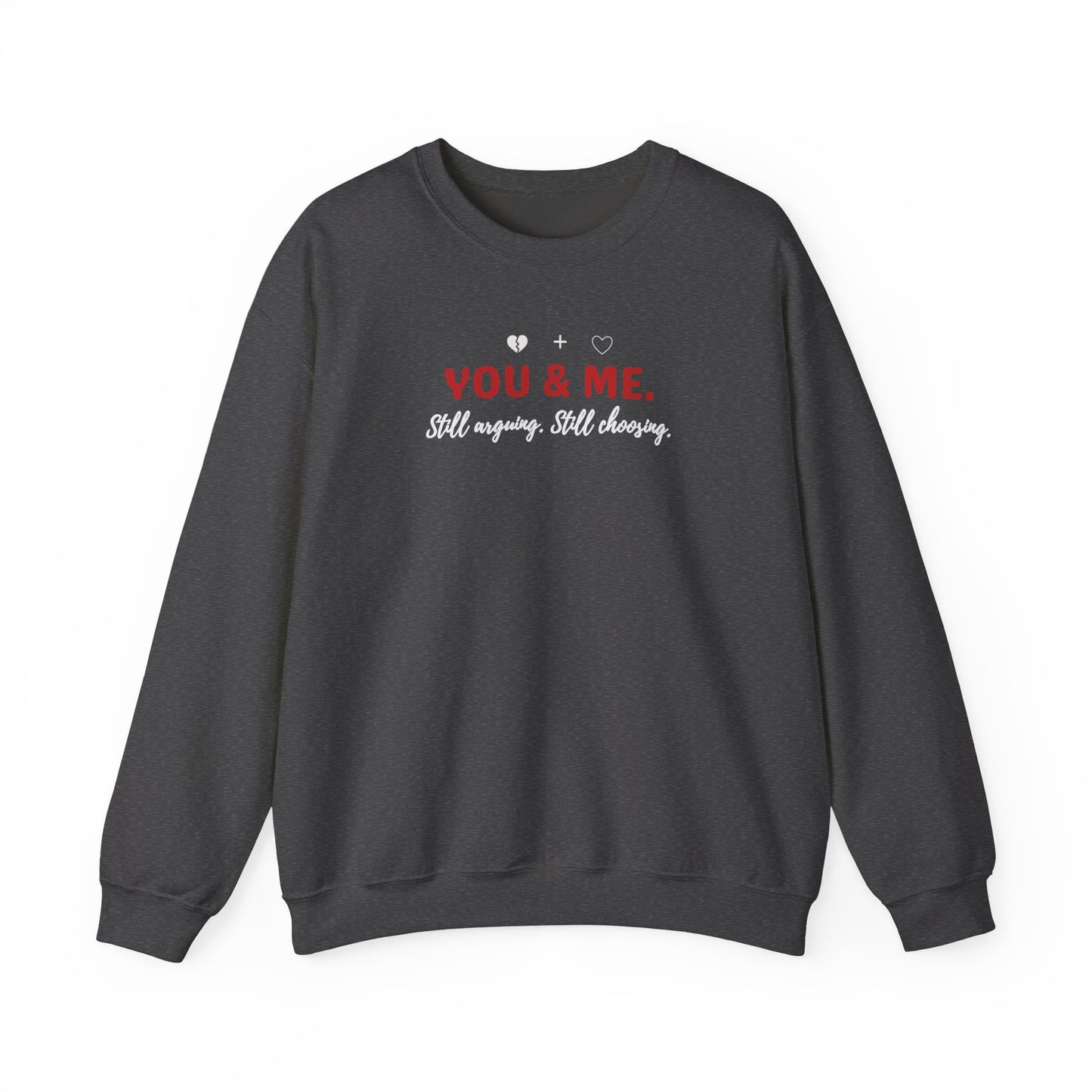 dark gray sweatshirt with 'YOU & ME. Still arguing. Still choosing.' text on a white background'
