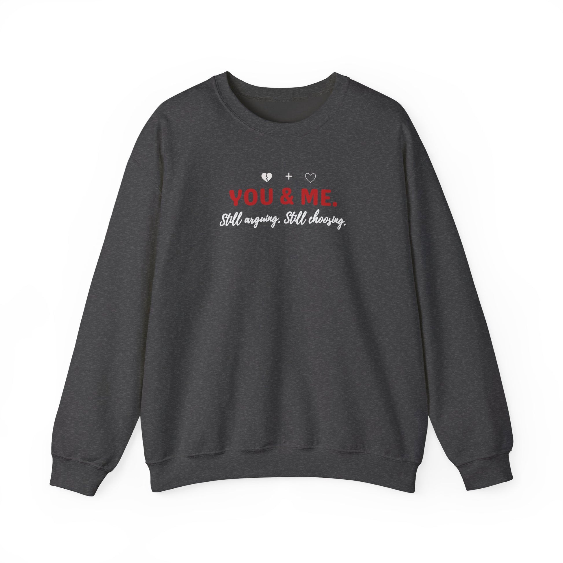 dark gray sweatshirt with 'YOU & ME. Still arguing. Still choosing.' text on a white background'