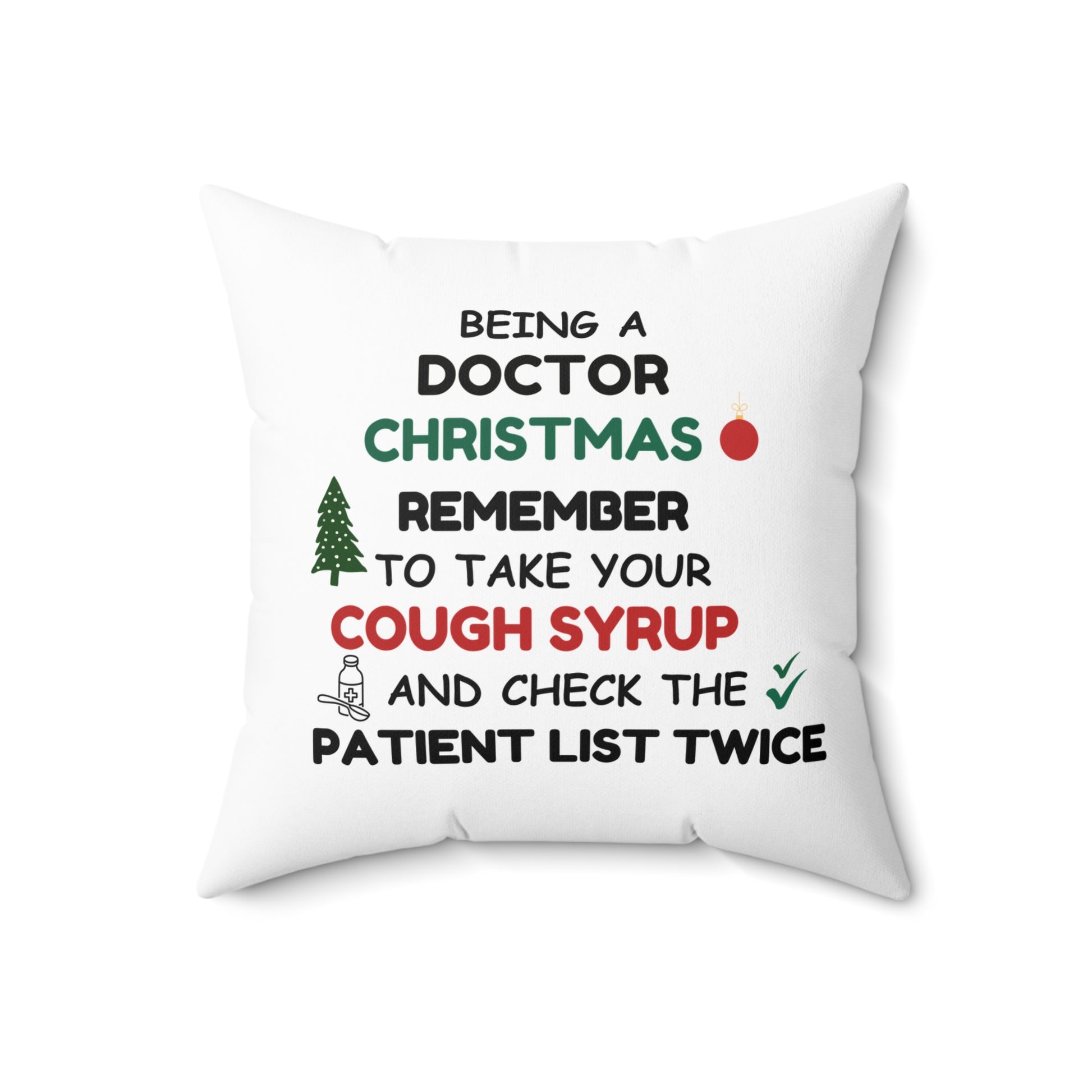 White pillow with text 'Being a doctor during Christmas, remember to take your cough syrup and check the patient list twice' on a white background, 18" x 18'