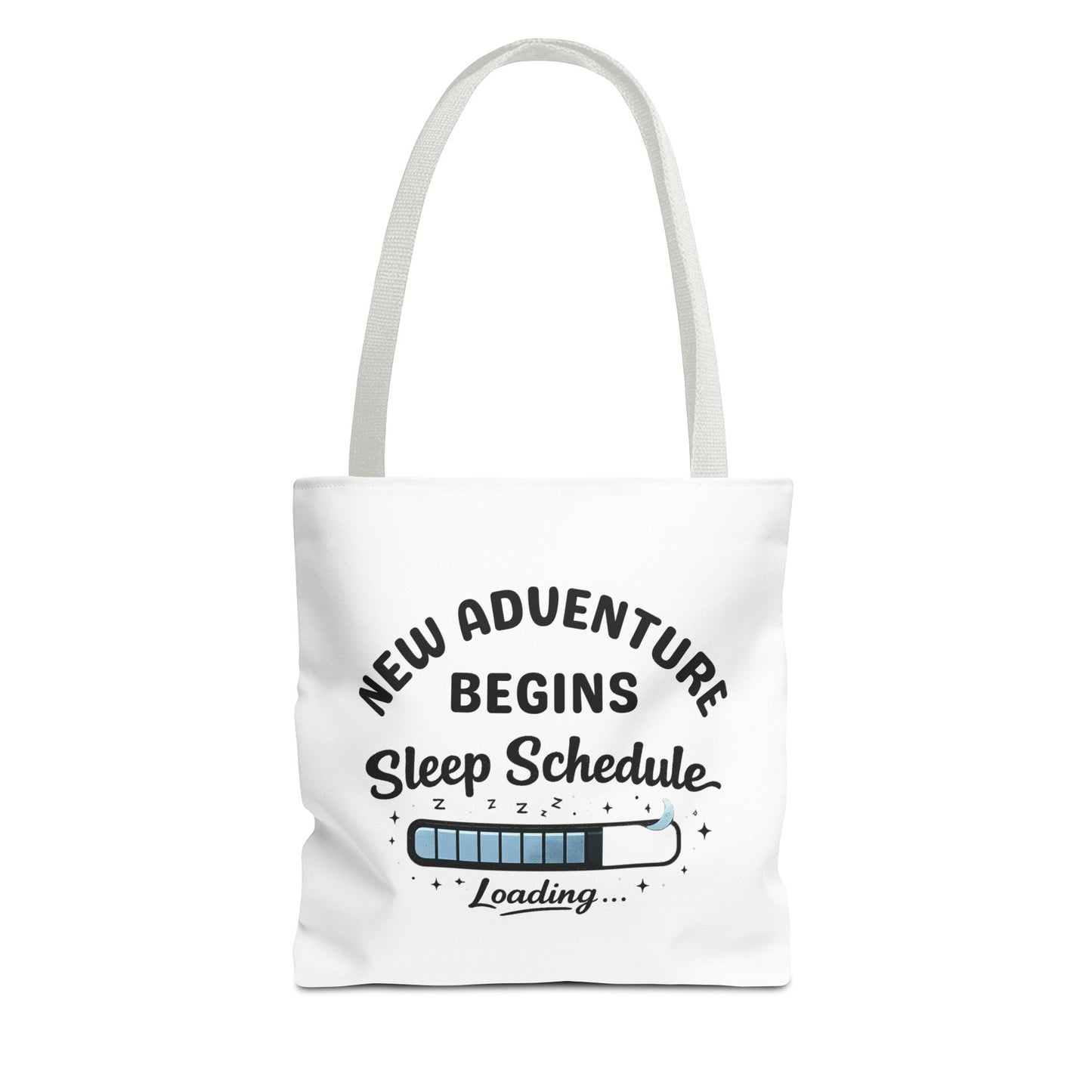 Tote bag with white handle and 'New Adventure Begins Sleep Schedule Loading' text on a white background