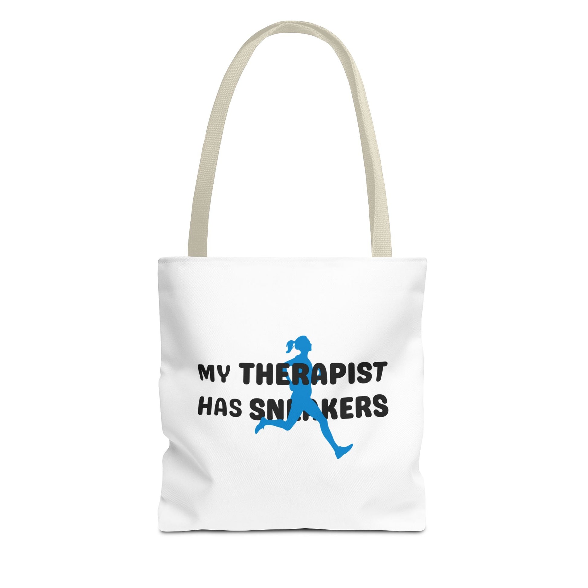 Tote bag with beige handle and text 'My Therapist Has Sneakers' on a white background