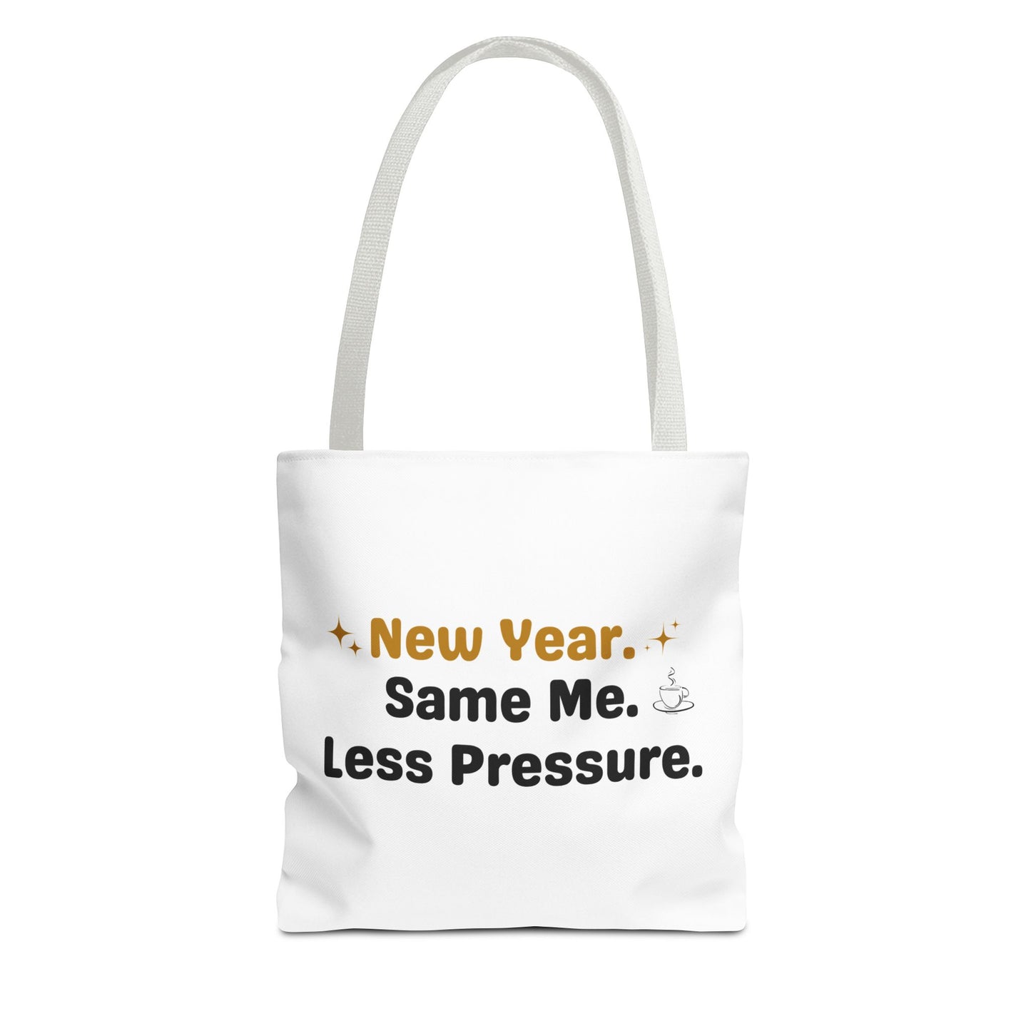 White tote bag with white handle and text 'New Year. Same Me. Less Pressure.' and handle on a white background