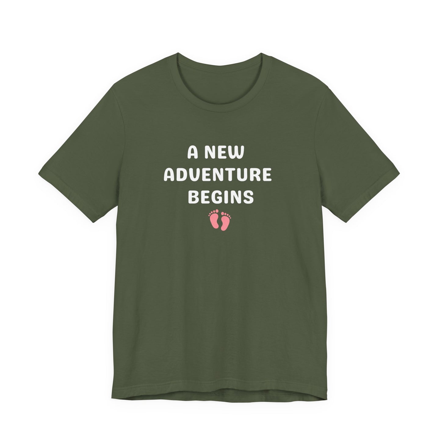 Green t-shirt with 'A New Adventure Begins' text and footprints on a white background