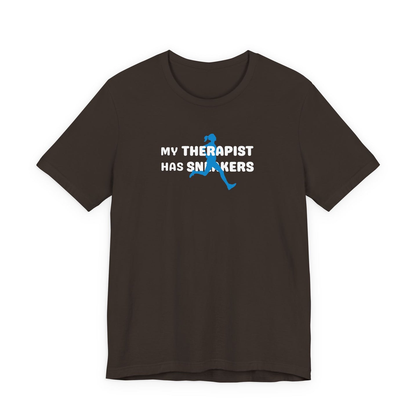 Brown t-shirt with text 'My Therapist Has Snickers' on a white background