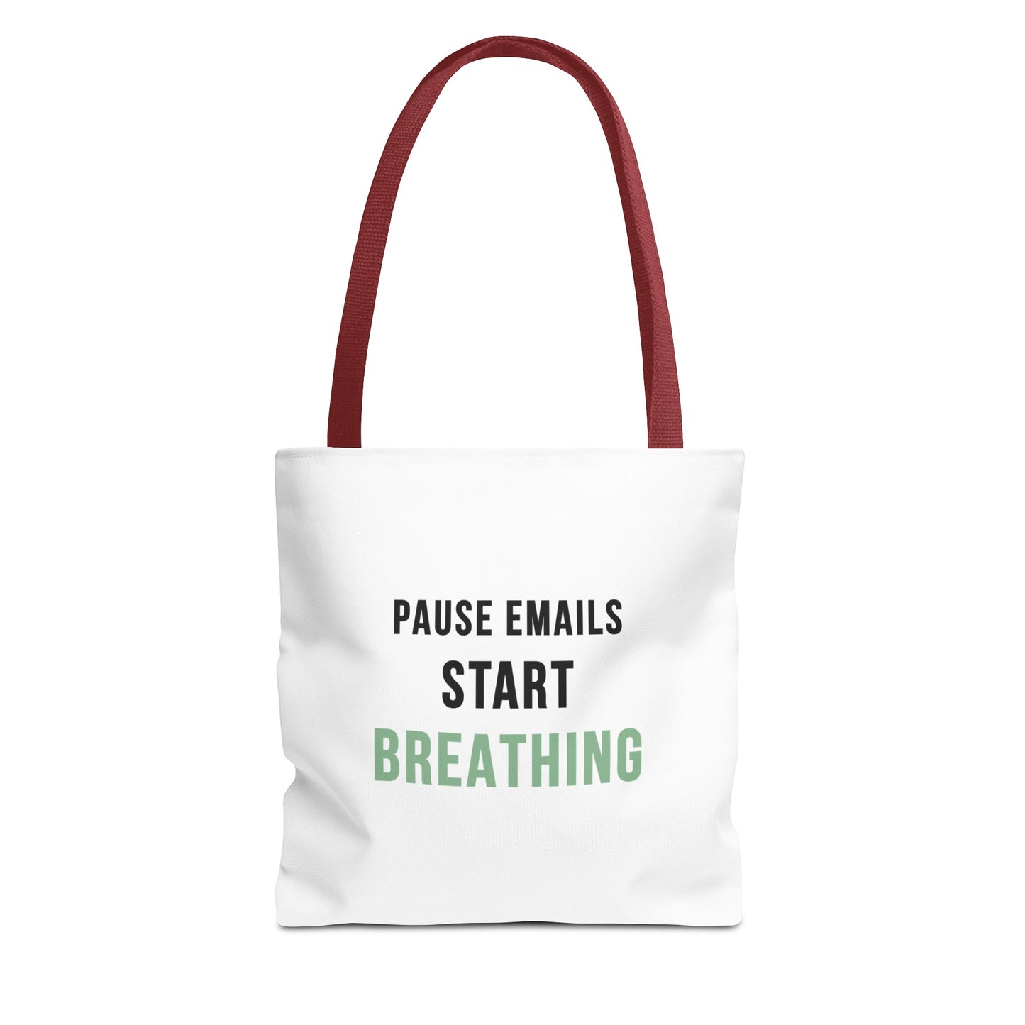 White tote bag with red handles and text 'Pause Emails, Start Breathing' on a white background