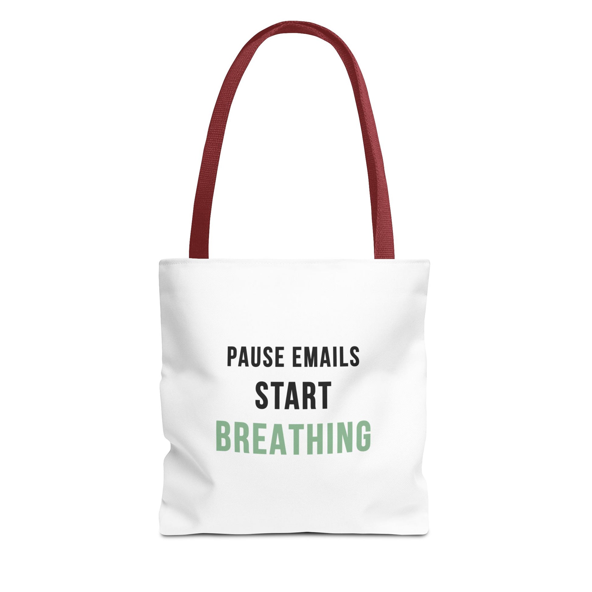 White tote bag with red handles and text 'Pause Emails, Start Breathing' on a white background
