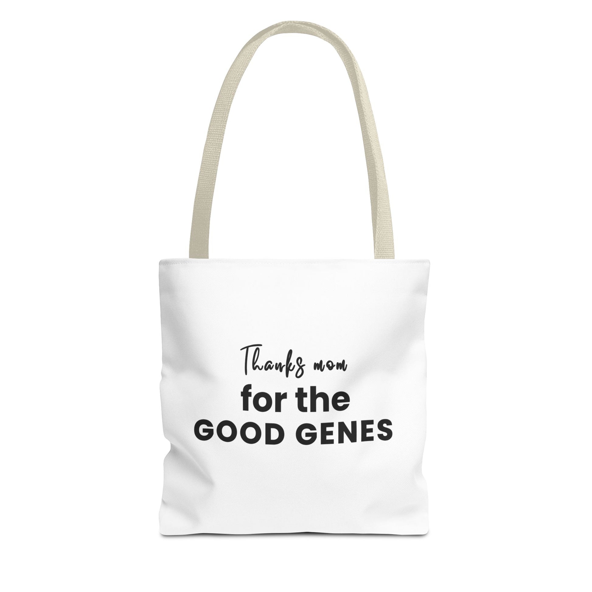 Tote bag with beige handles and text 'Thanks Mom for the Good Genes' on a white background