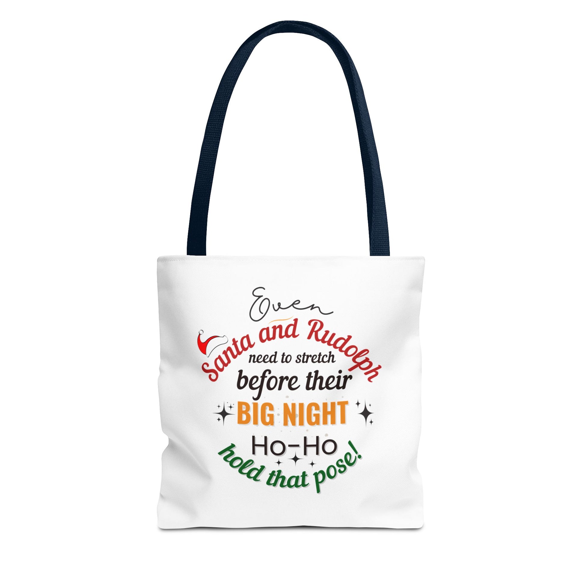 White tote bag with navy handle and text 'Event Santa & Rudolph Need to Stretch Before their Big Night. Ho-Ho-Hold That Pose!' on a white background