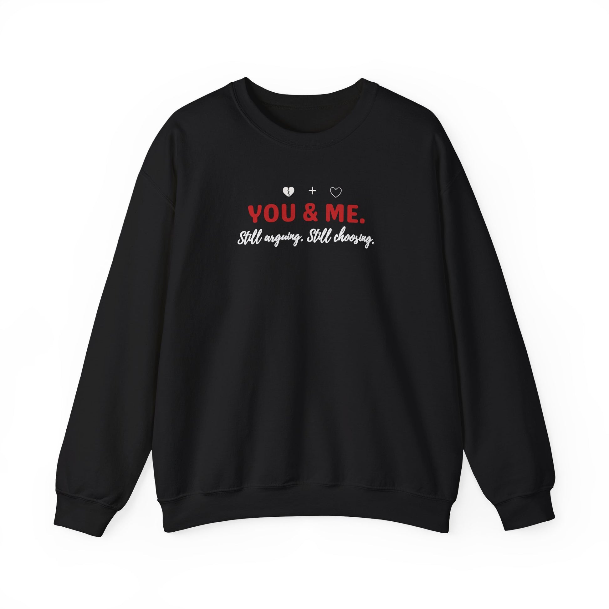Black sweatshirt with 'YOU & ME. Still arguing. Still choosing.' text on a white background
