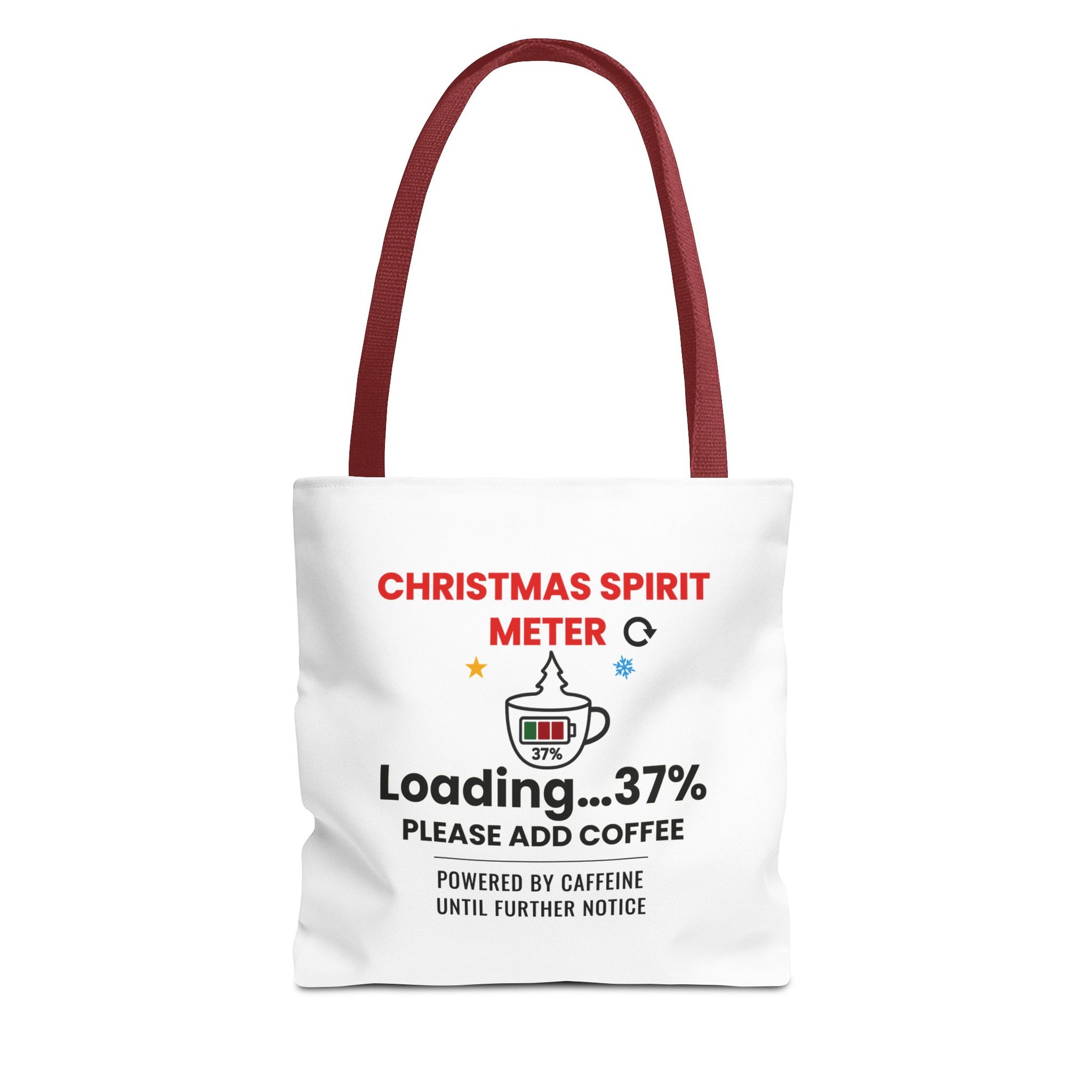 Tote bag with red handle and text 'Christmas Spirit Meter, Loading…37%. Please add coffee. Powered by caffeine until further notice' on a white background