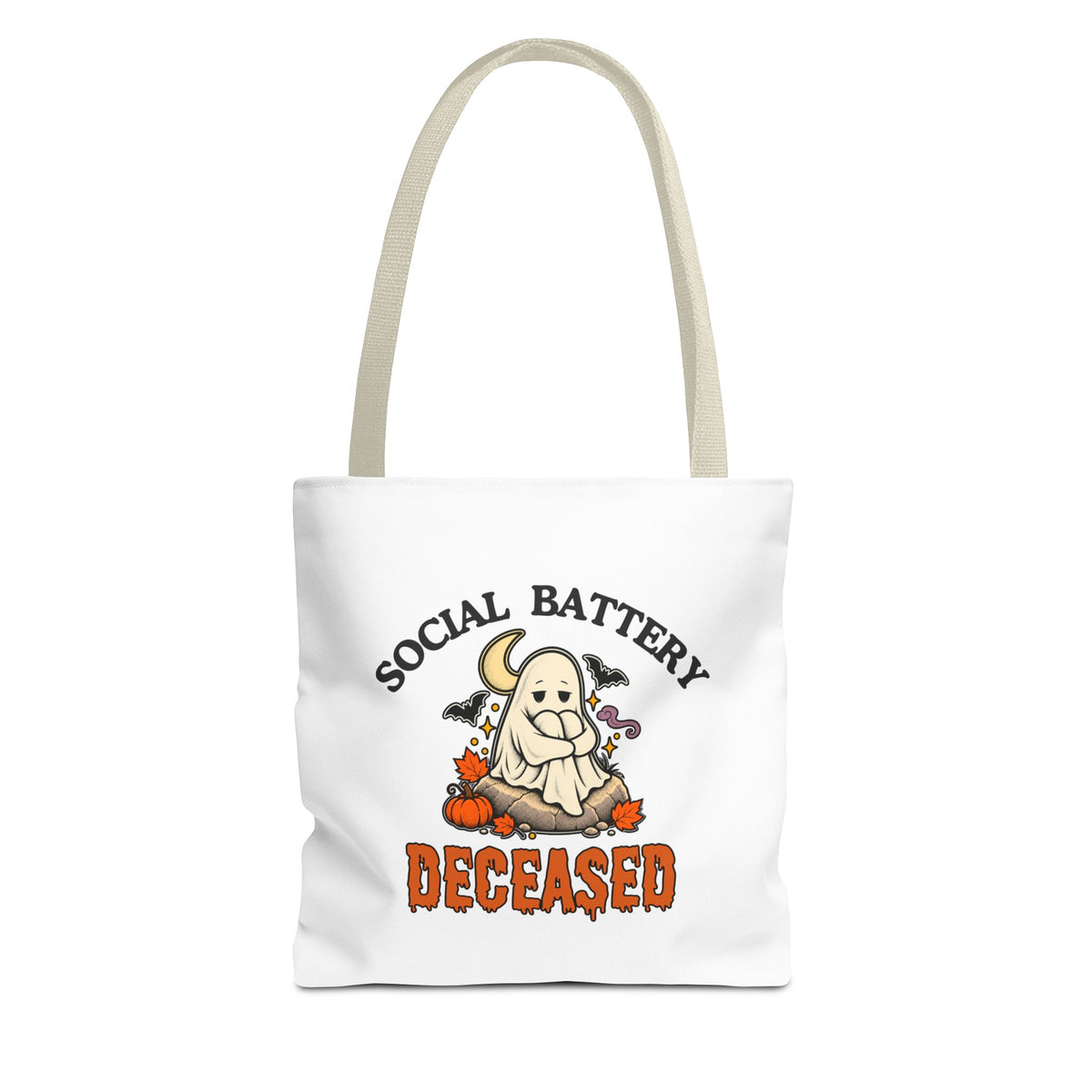 A white tote bag with beige handles, featuring a 'Social Battery: Deceased' graphic with a ghost sitting on a rock