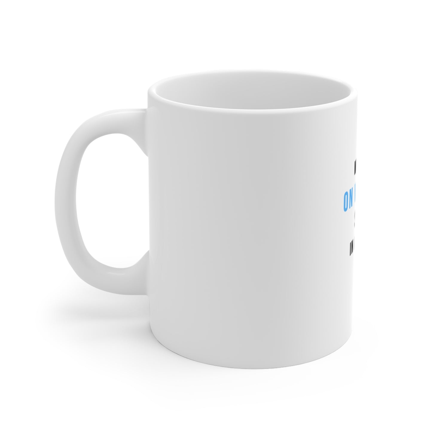 Left side view of a white mug with text 'Mentally on vacation, stuck in a meeting' on a white background