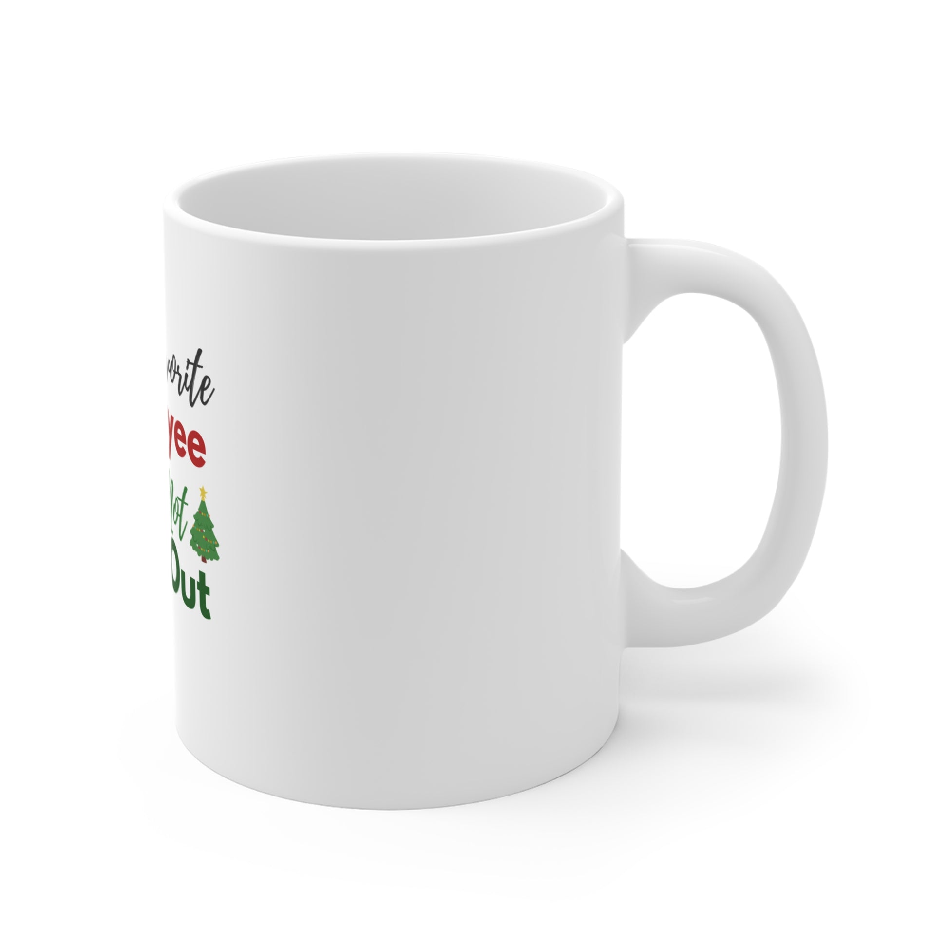 Right side view of white mug with text and a Christmas tree design on a white background