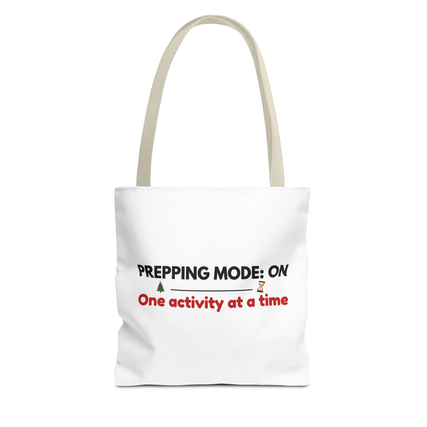 Tote bag with beige handle and text 'Prepping Mode: On One Activity at a Time' on a white background