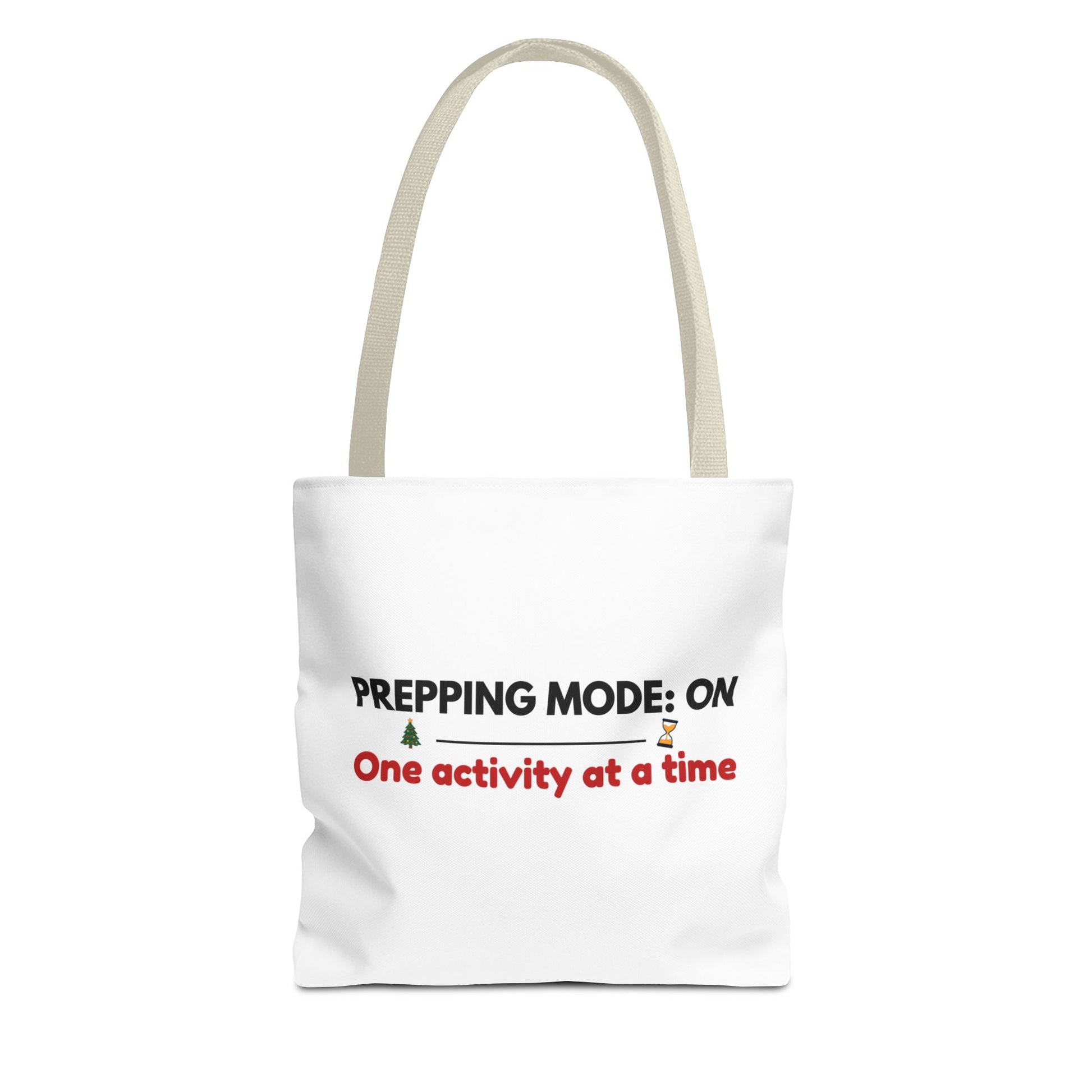 Tote bag with beige handle and text 'Prepping Mode: On One Activity at a Time' on a white background