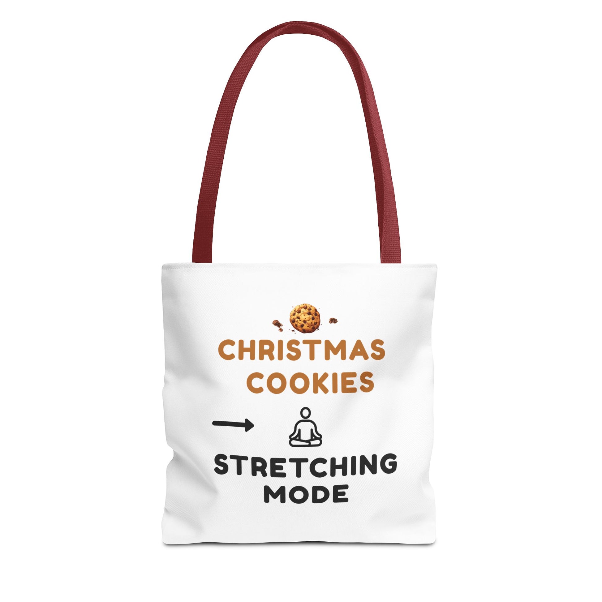 White tote bag with red handle and text 'Christmas Cookies, Stretching Mode' on a white background